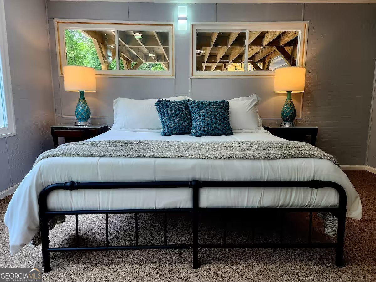 326 Turkey Run Dublin, GA 31021 - Photo 95 of 114 a bedroom with a bed and window