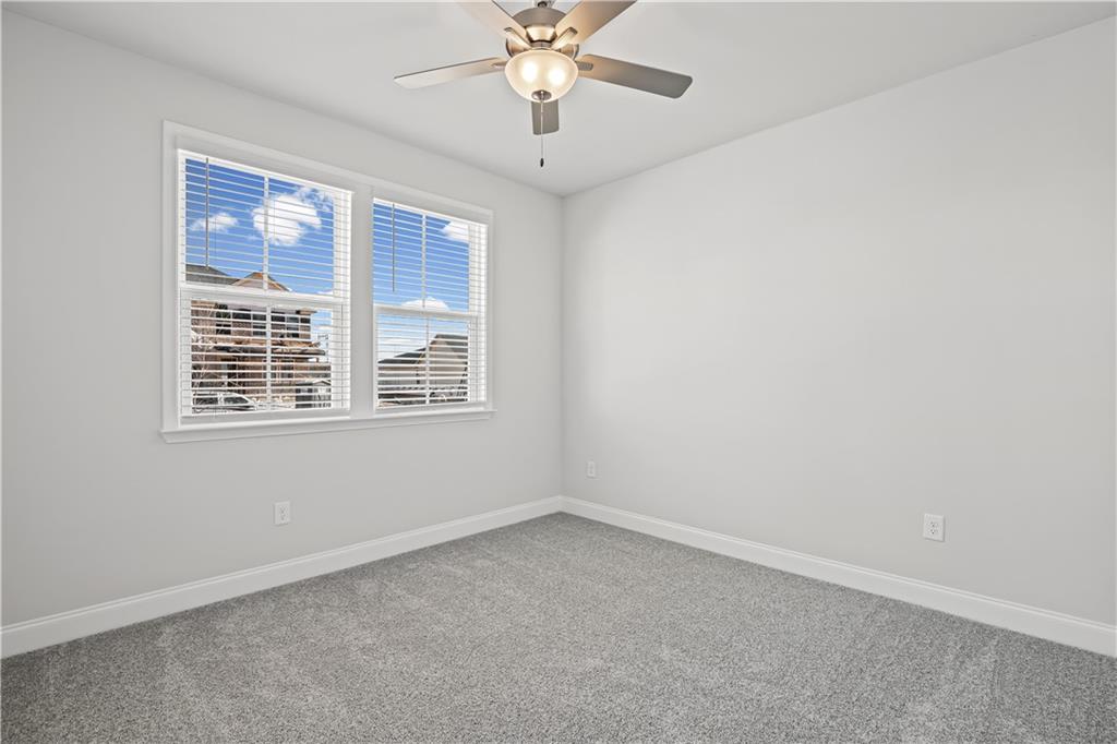 248 Nesta Grove Locust Grove, GA 30248 - Photo 20 of 40 an empty room with a window