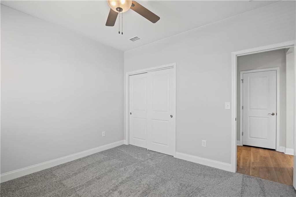 248 Nesta Grove Locust Grove, GA 30248 - Photo 21 of 40 a view of an empty room