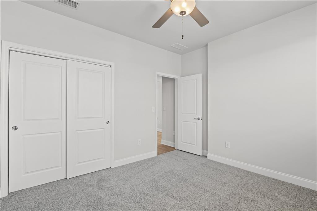 248 Nesta Grove Locust Grove, GA 30248 - Photo 22 of 40 a view of an empty room