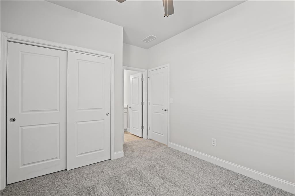 248 Nesta Grove Locust Grove, GA 30248 - Photo 26 of 40 a view of an empty room