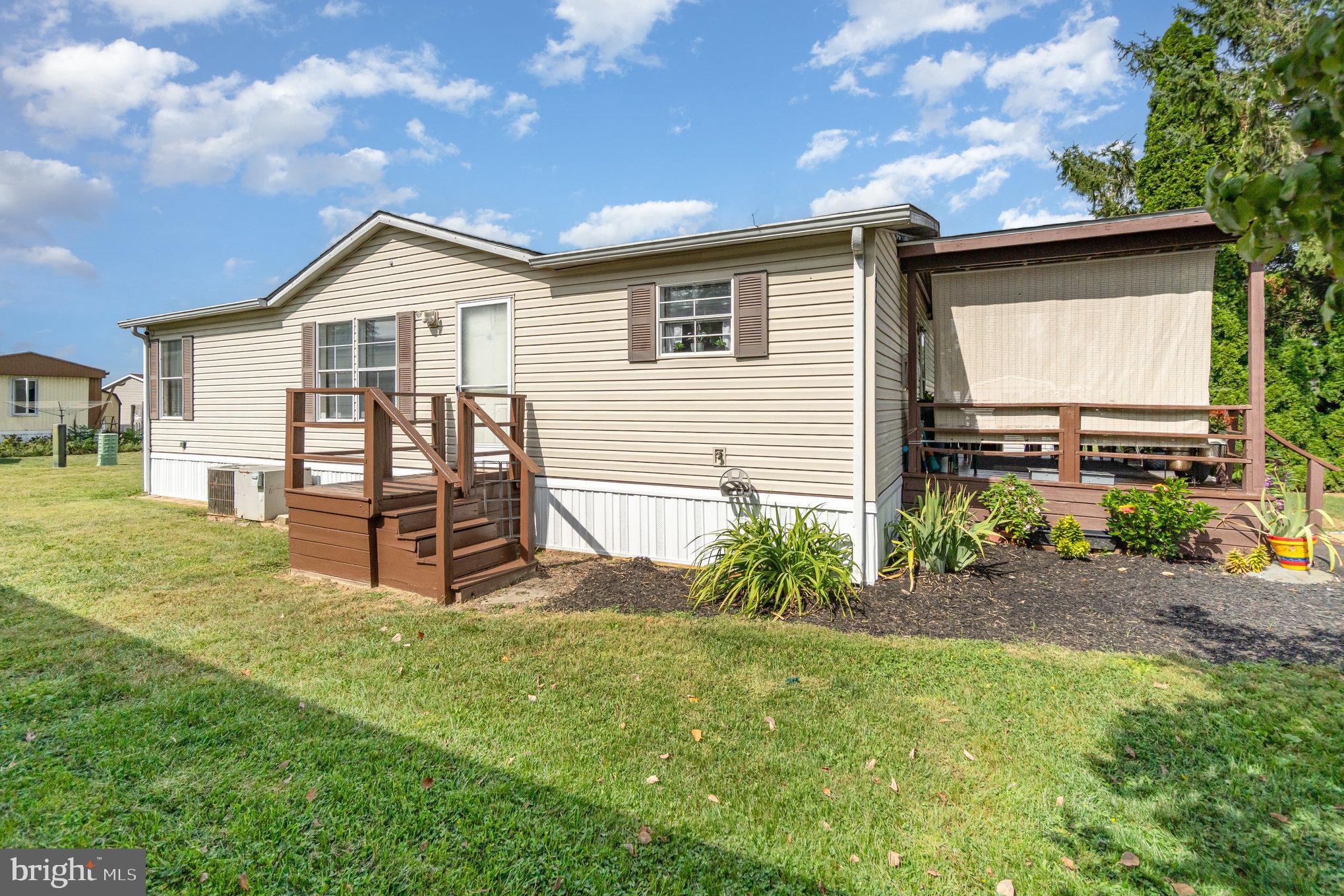 90 Penn Valley Village Lititz, PA 17543 - Photo 22 of 26 a front view of a house with garden