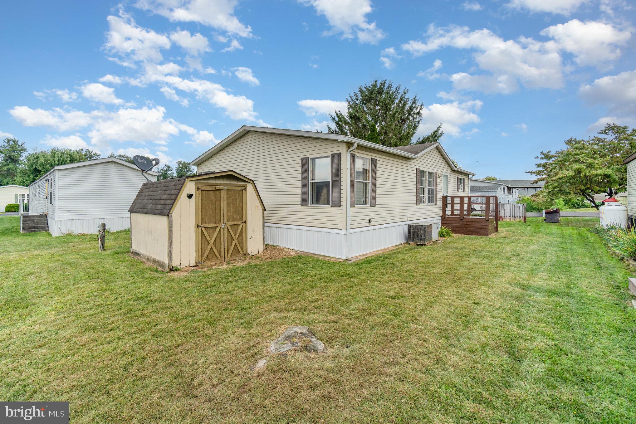 90 Penn Valley Village Lititz, PA 17543 - Photo 24 of 26 a house that has a tree in front of it