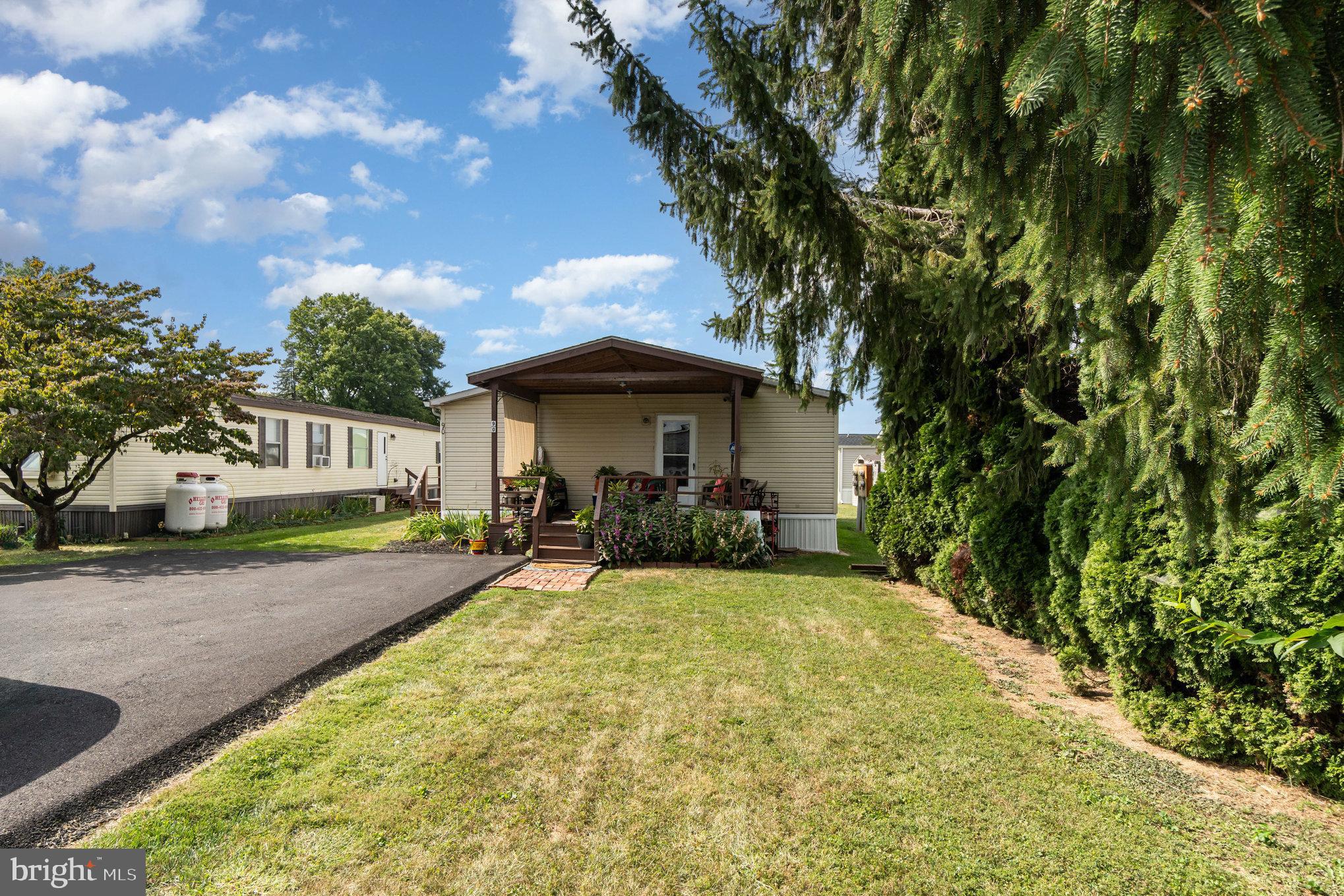 90 Penn Valley Village Lititz, PA 17543 - Photo 4 of 26 a view of a house with swimming pool and sitting area