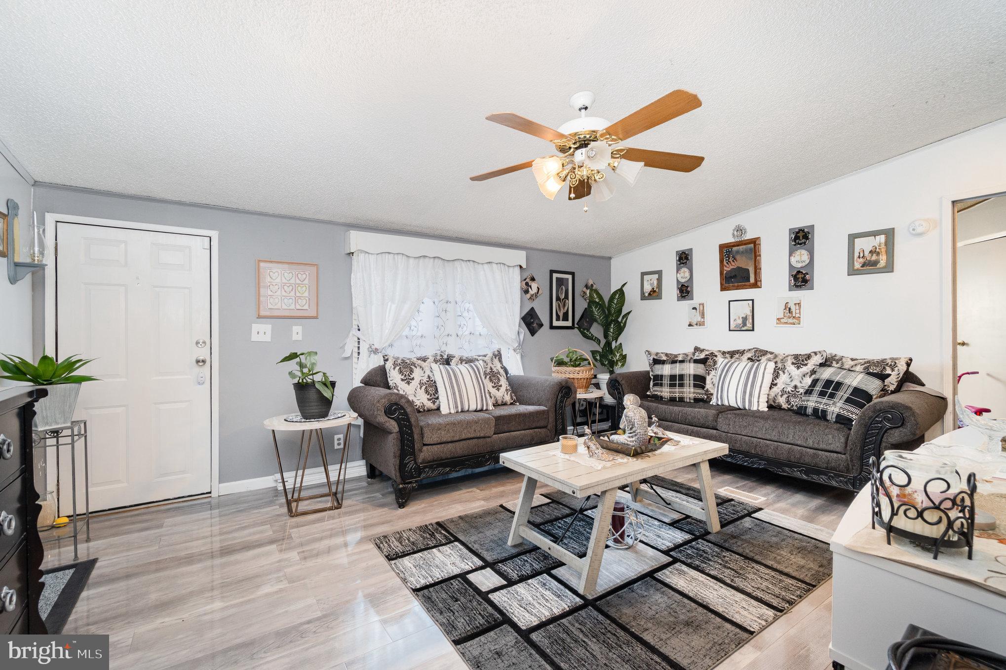 90 Penn Valley Village Lititz, PA 17543 - Photo 7 of 26 a living room with furniture and a large window