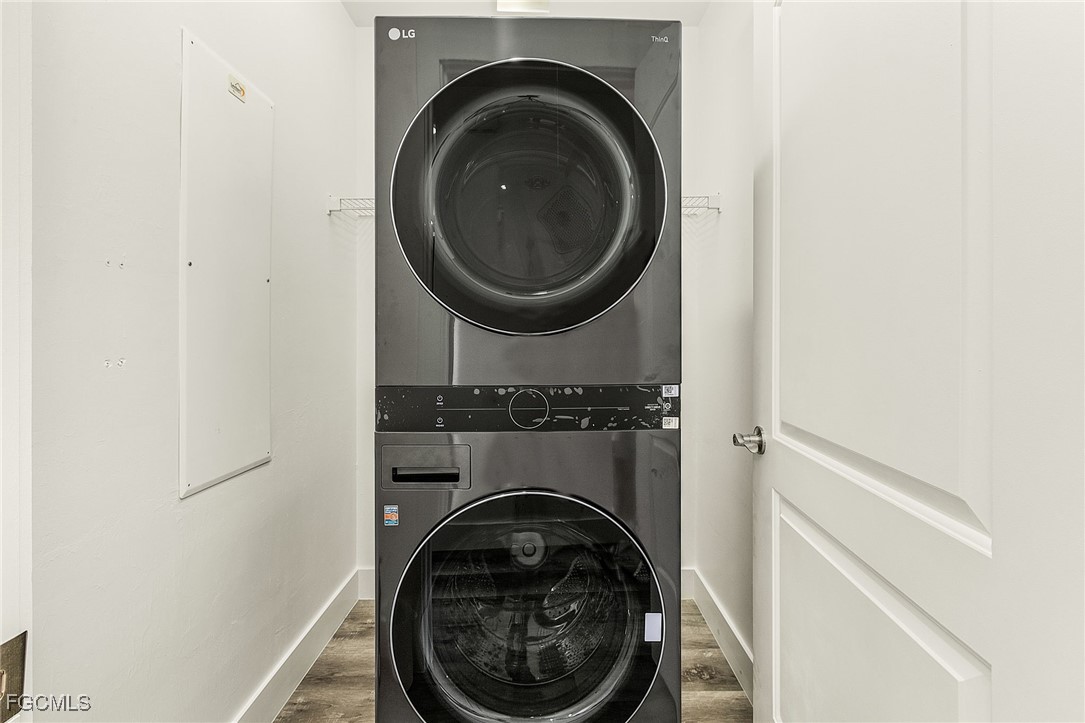 2110 West First Street, Unit 103 Fort Myers, FL 33901 - Photo 22 of 38 a utility room with dryer and washer