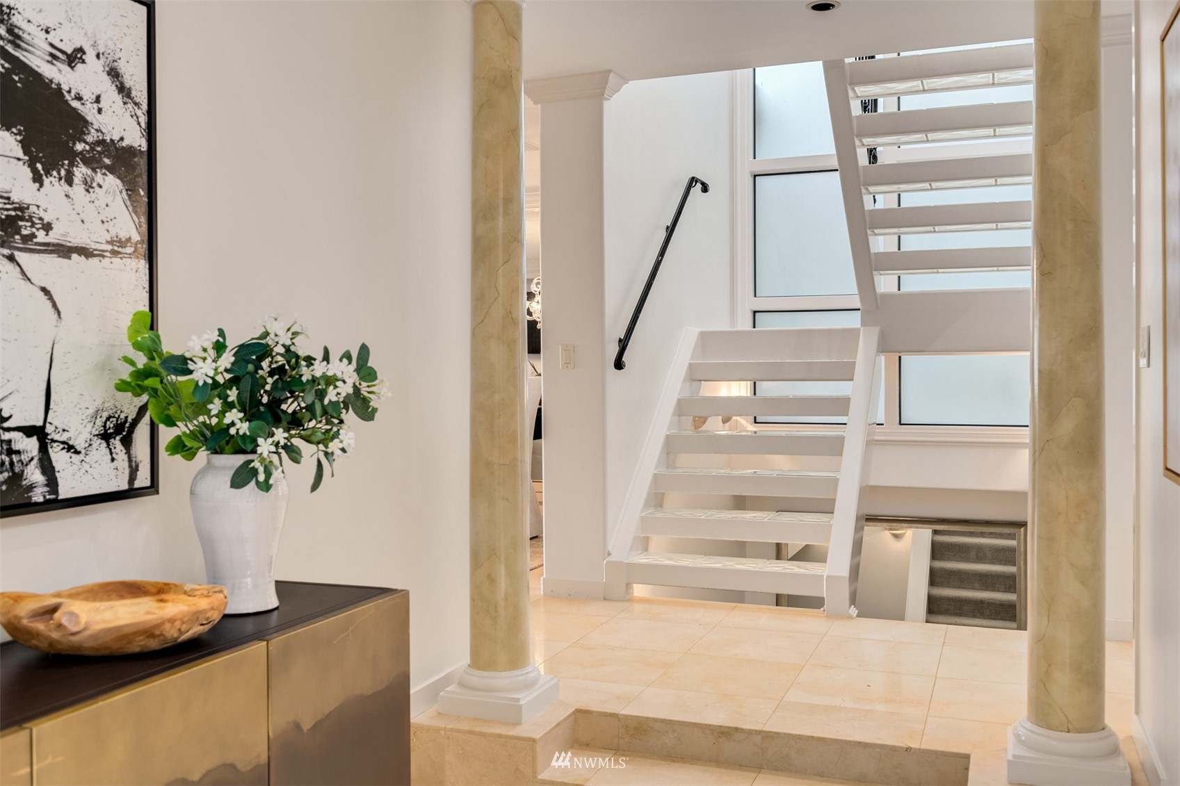 3768 West Commodore Way Seattle, WA 98199 - Photo 15 of 37 a view of entryway with wooden floor