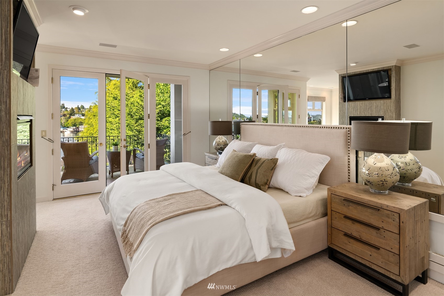 3768 West Commodore Way Seattle, WA 98199 - Photo 16 of 37 a bed room with a bed window and a television