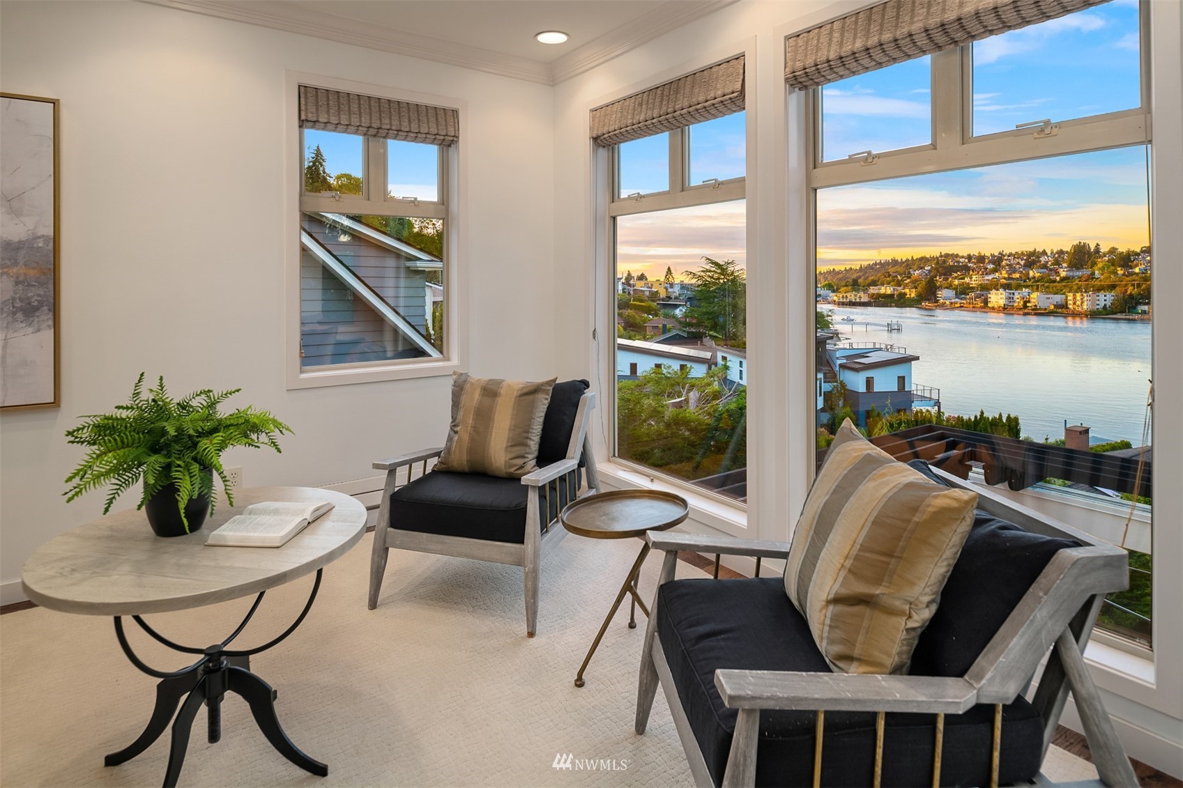 3768 West Commodore Way Seattle, WA 98199 - Photo 19 of 37 a living room with furniture lamp and a large window