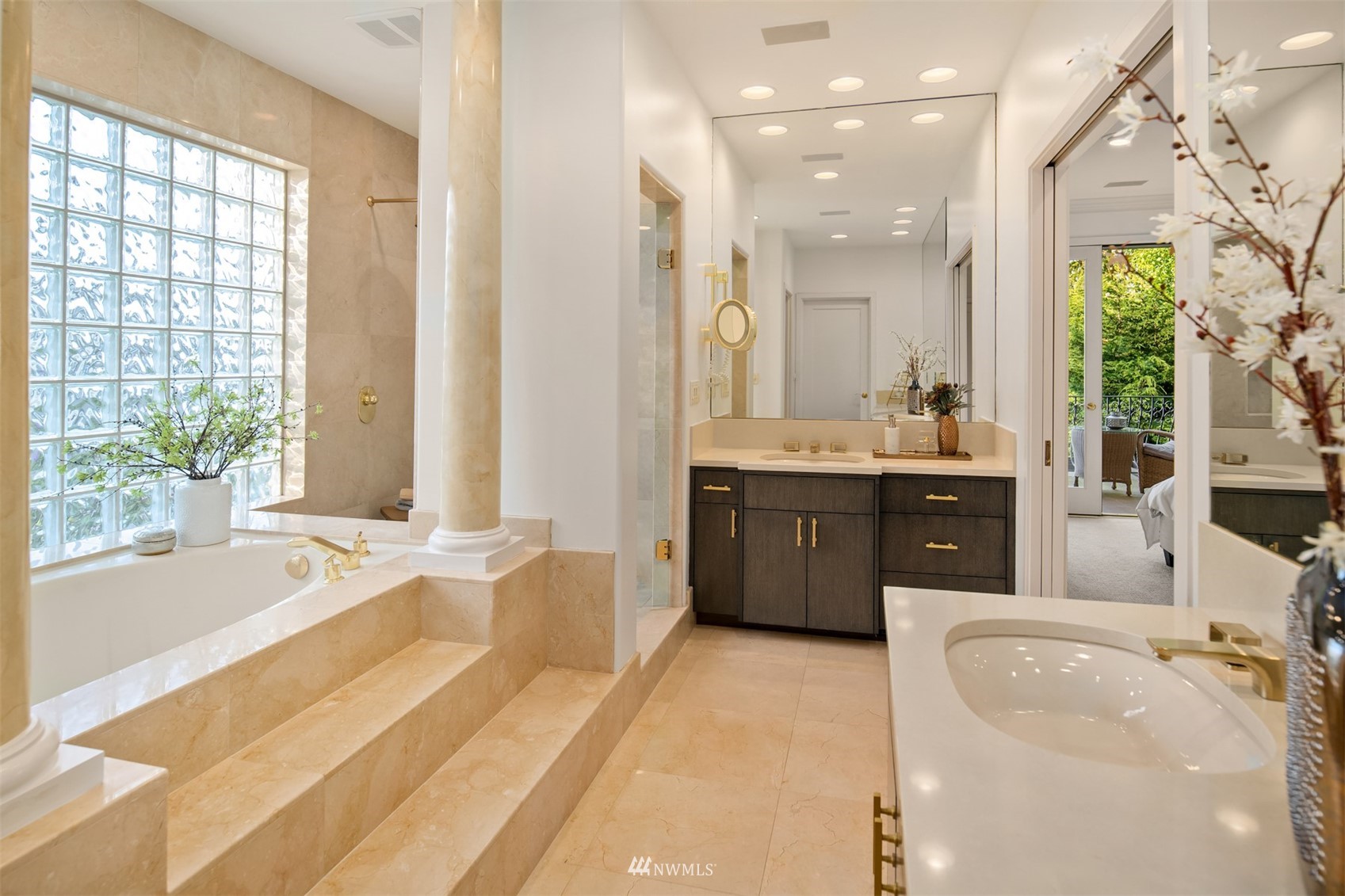 3768 West Commodore Way Seattle, WA 98199 - Photo 20 of 37 a spacious bathroom with a tub sink and mirror