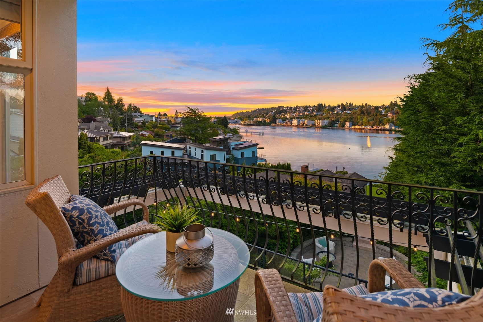 3768 West Commodore Way Seattle, WA 98199 - Photo 21 of 37 a view of a balcony with lake view and a potted plant