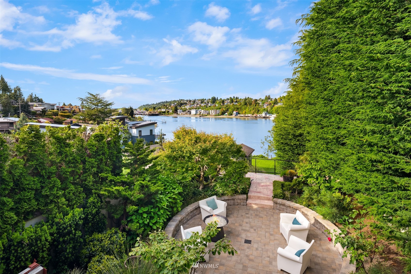 3768 West Commodore Way Seattle, WA 98199 - Photo 27 of 37 a view of a lake with a yard