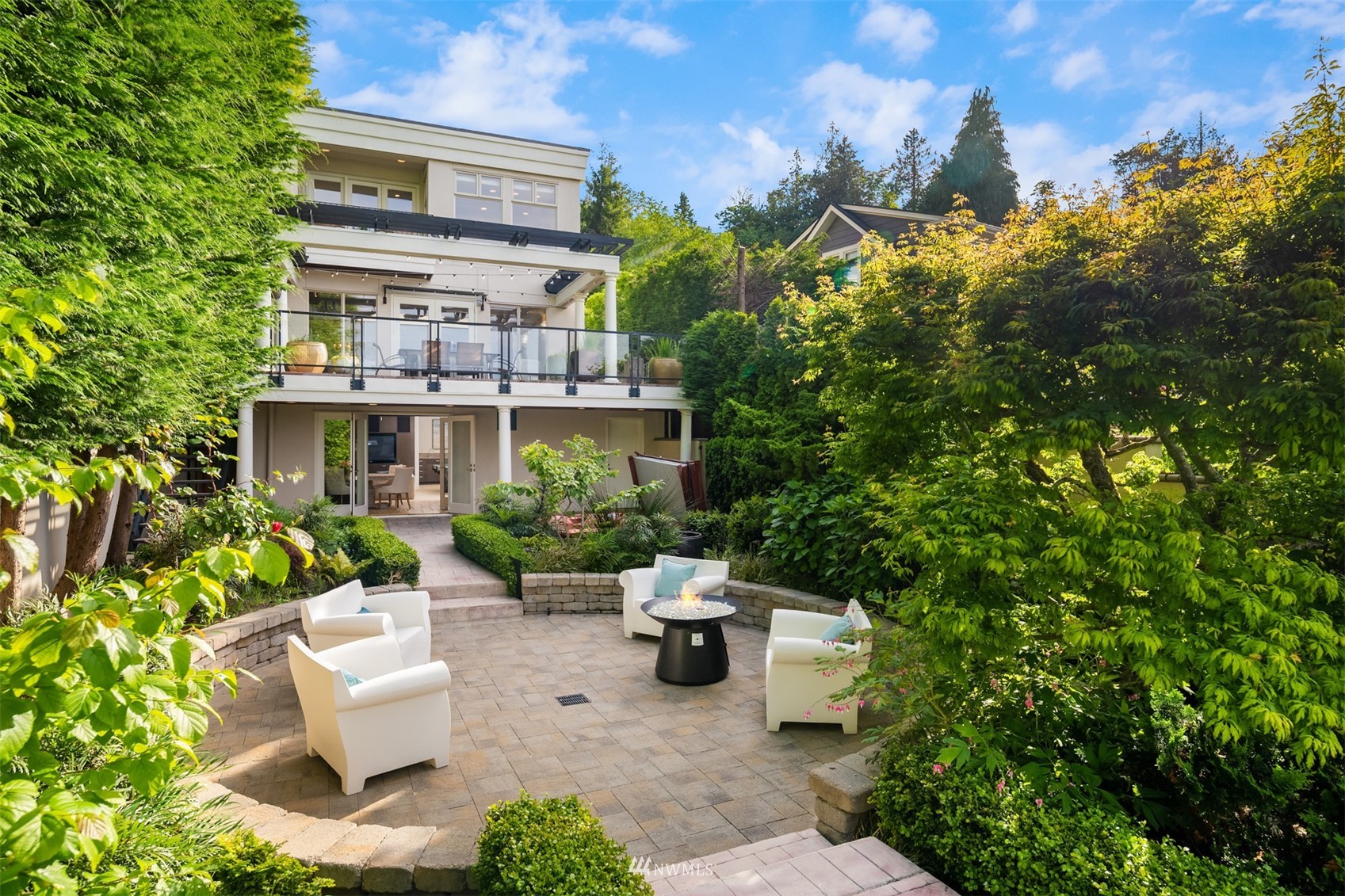 3768 West Commodore Way Seattle, WA 98199 - Photo 29 of 37 a view of a patio with couches and potted plants