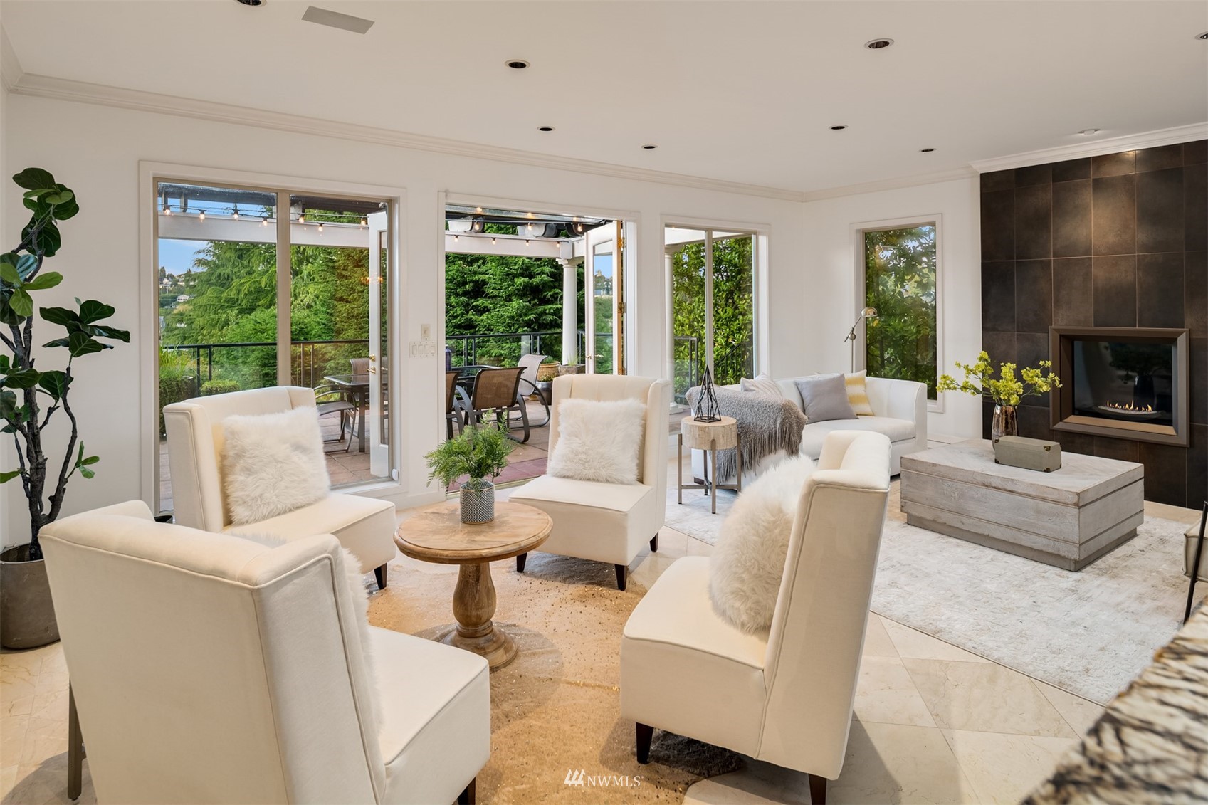 3768 West Commodore Way Seattle, WA 98199 - Photo 5 of 37 a living room with fireplace furniture and a large window