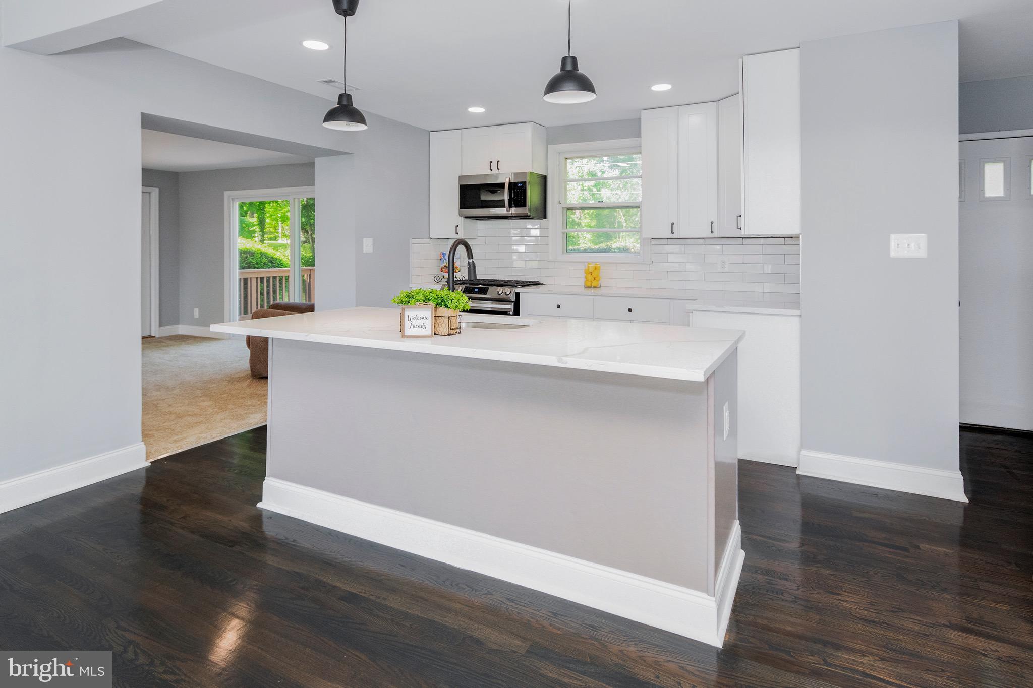 4602 Cedar Garden Road Baltimore, MD 21229 - Photo 9 of 38 kitchen looking into family room