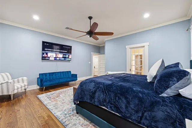 a bedroom with bed and a window