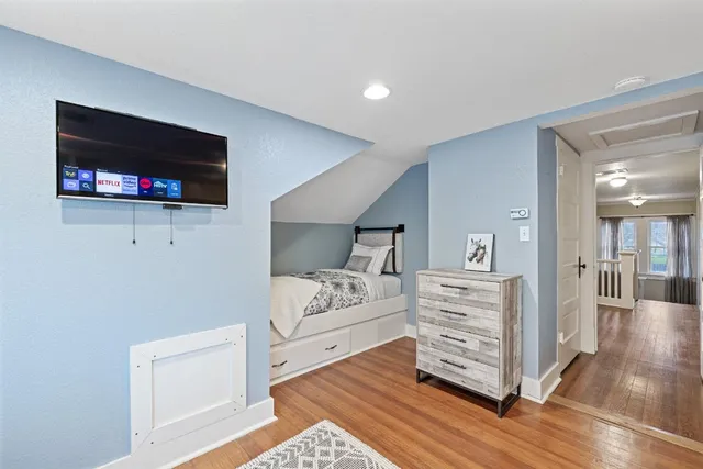 a view of living room with furniture and flat screen tv