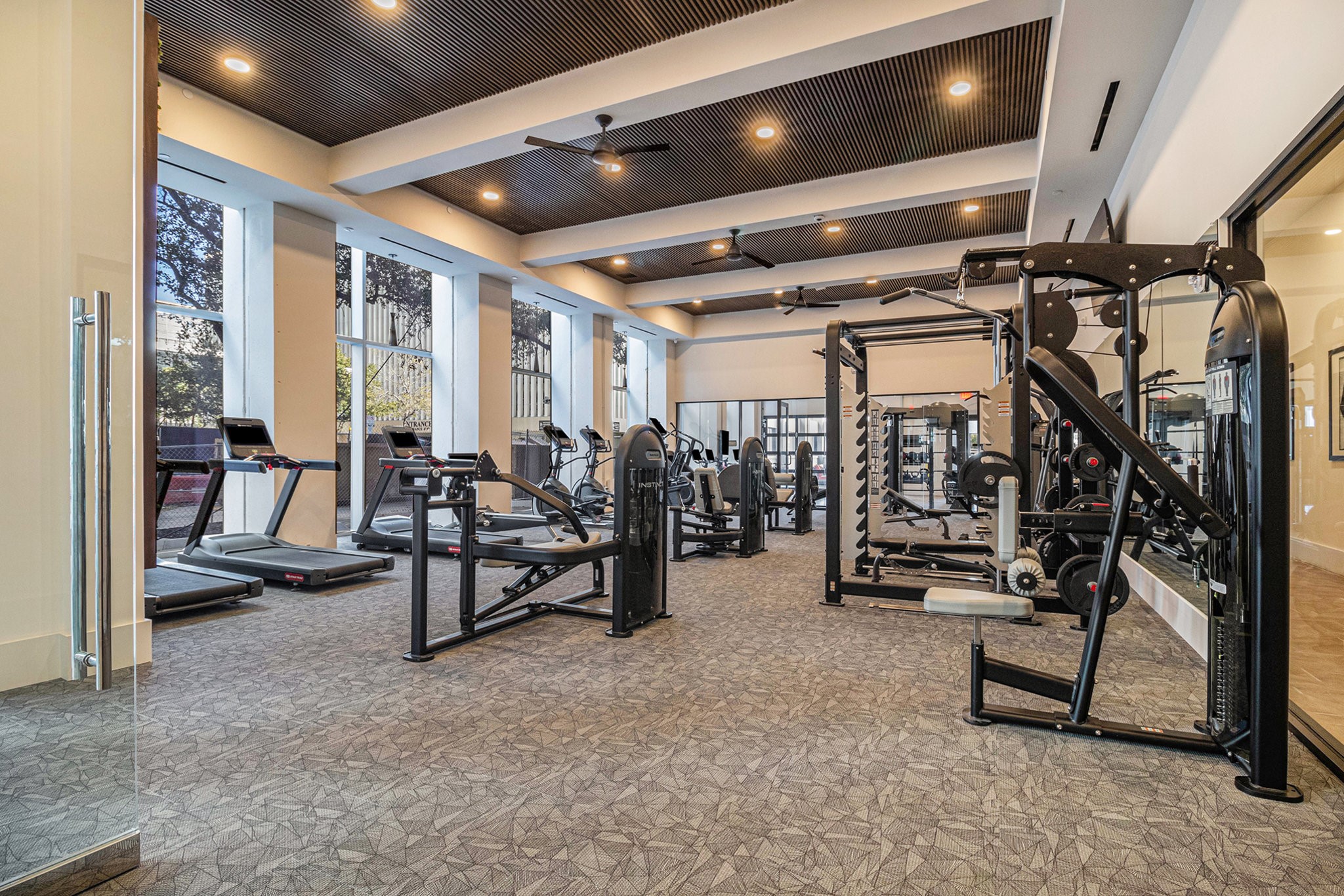 1801 Smith Street, Unit 2007 Houston, TX 77002 - Photo 14 of 25 a view of game room with gym equipment