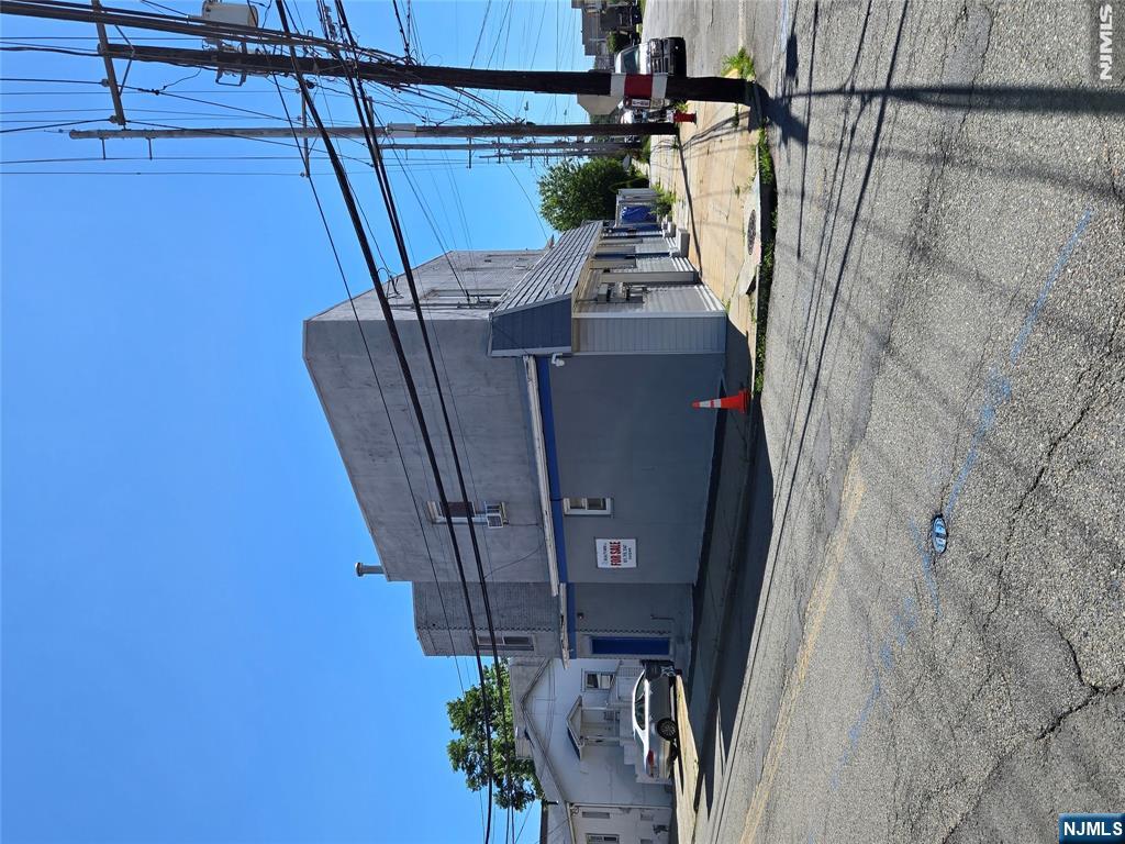 198 Kansas Street Hackensack, NJ 07601 - Photo 2 of 16 a view of a street