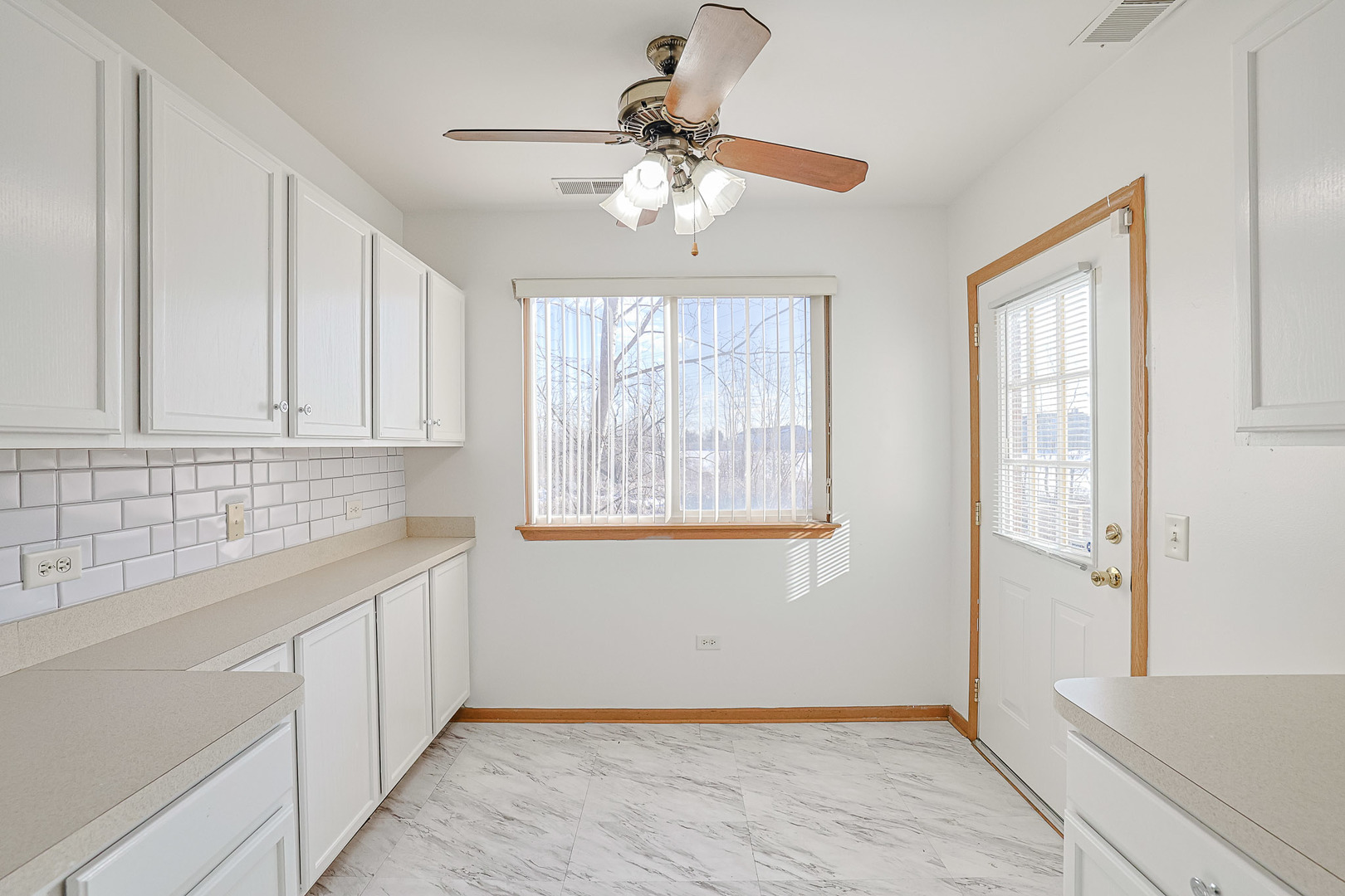 881 North Swift Road, Unit 206 Addison, IL 60101 - Photo 14 of 26 a view of an empty room with a window