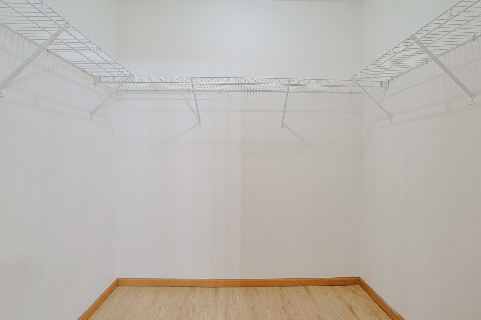 881 North Swift Road, Unit 206 Addison, IL 60101 - Photo 23 of 26 a view of a room with racks on the wall