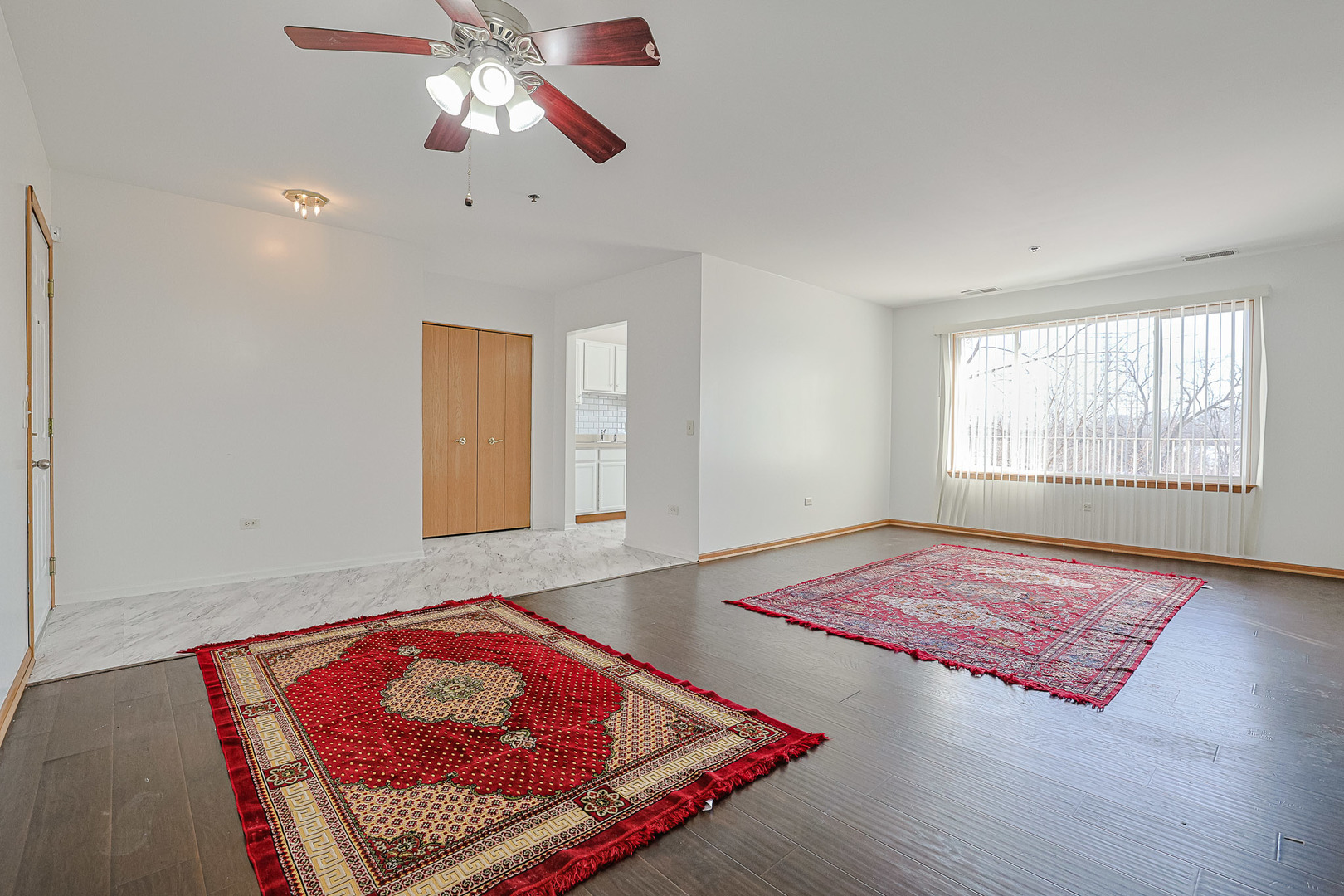 881 North Swift Road, Unit 206 Addison, IL 60101 - Photo 6 of 26 a bedroom with a bed and a window