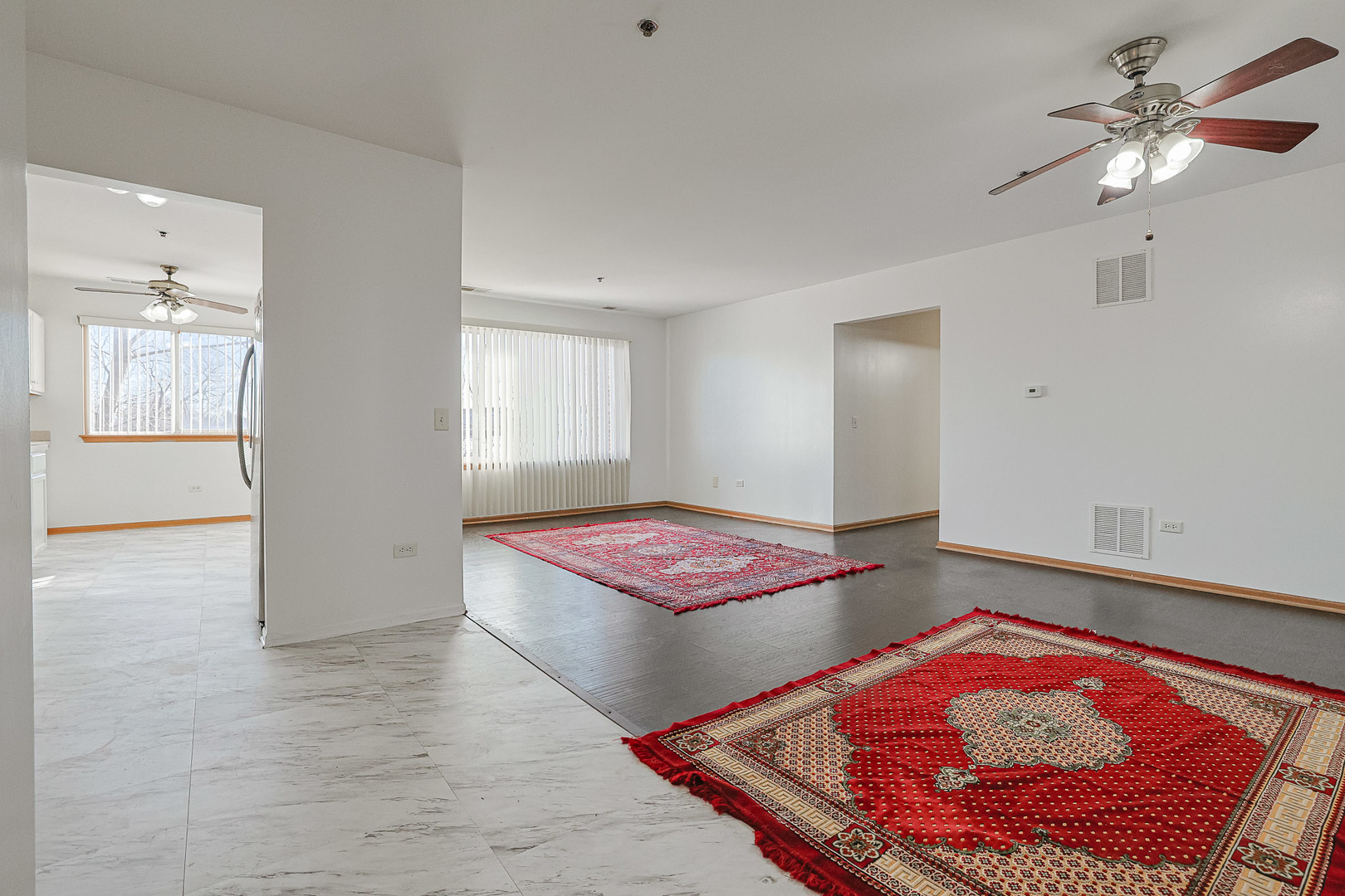 881 North Swift Road, Unit 206 Addison, IL 60101 - Photo 8 of 26 wooden floor with a rug and a workspace