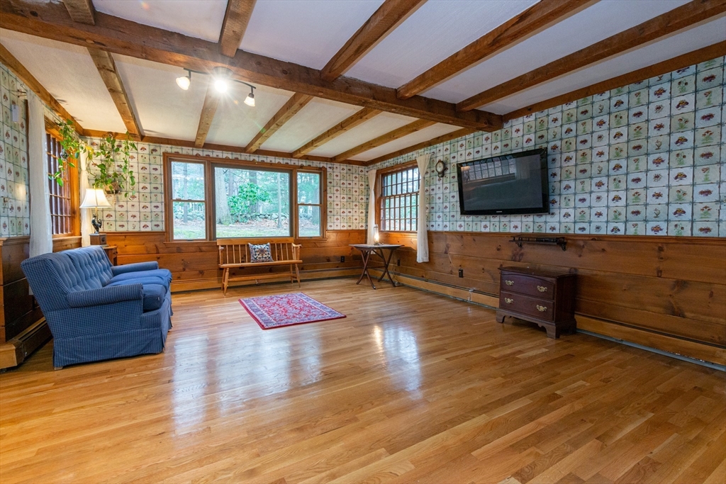 15 Hart Road Lynnfield, MA 01940 - Photo 15 of 40 a living room with furniture and a flat screen tv
