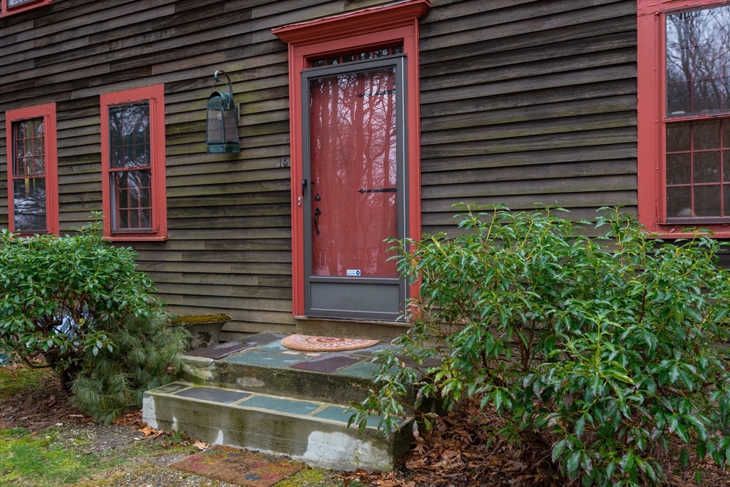 15 Hart Road Lynnfield, MA 01940 - Photo 2 of 40 a front view of a house with a yard