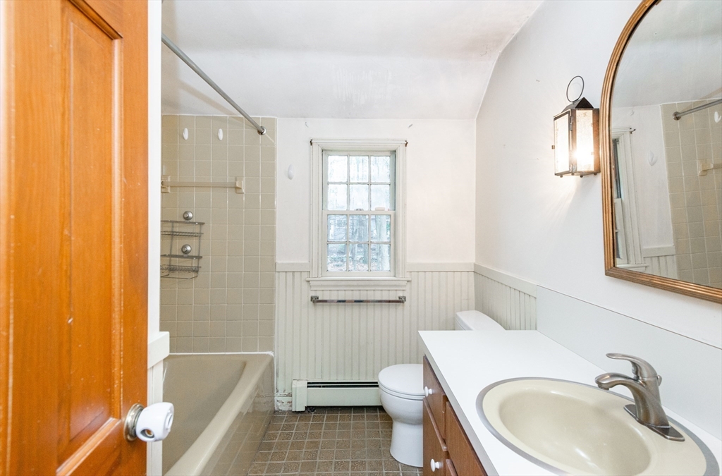 15 Hart Road Lynnfield, MA 01940 - Photo 26 of 40 a bathroom with a sink toilet and shower