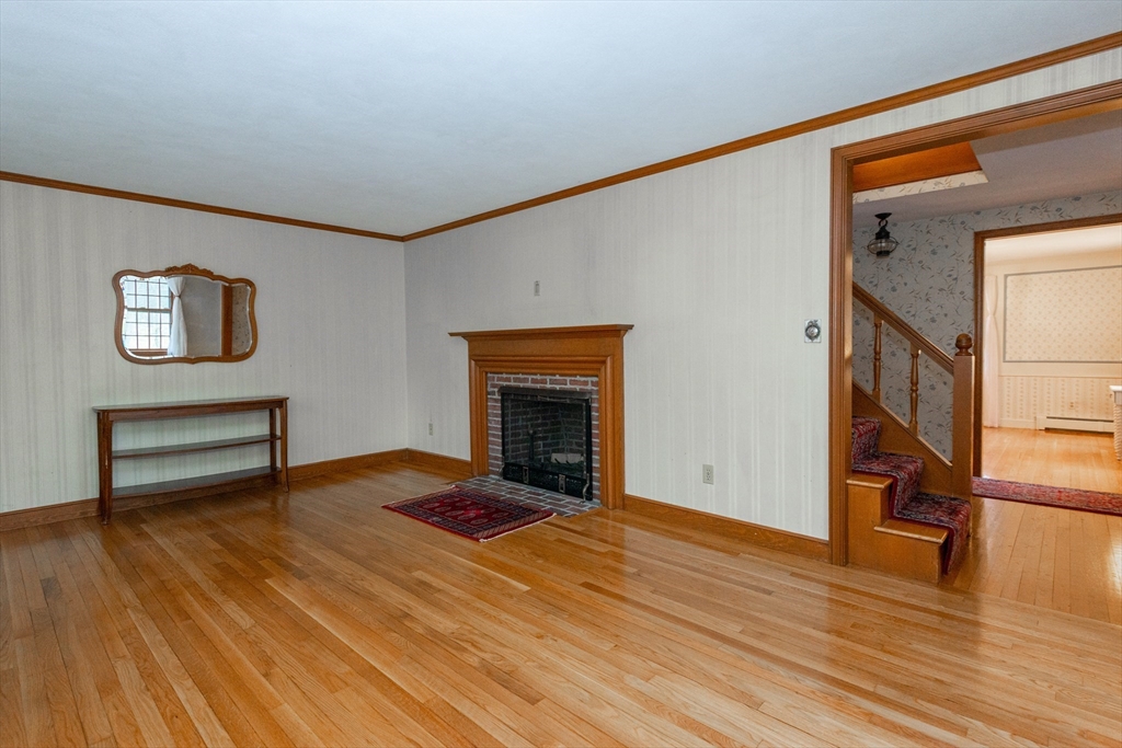 15 Hart Road Lynnfield, MA 01940 - Photo 3 of 40 a view of livingroom with furniture and fireplace