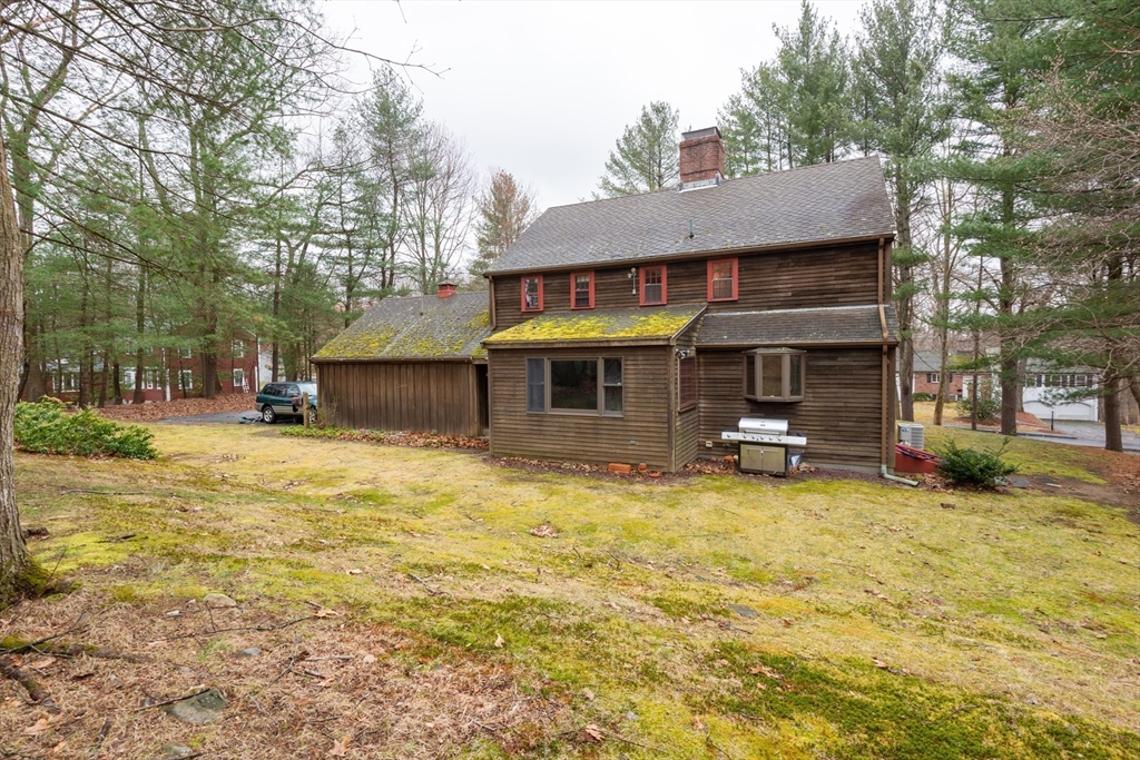 15 Hart Road Lynnfield, MA 01940 - Photo 36 of 40 a view of a house with a yard and garage