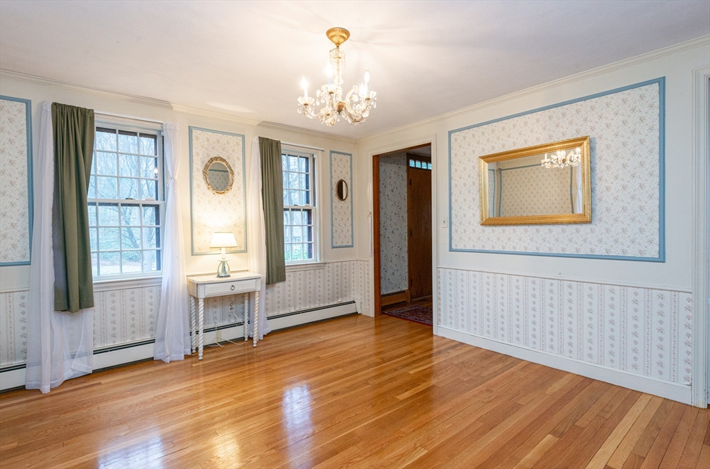 15 Hart Road Lynnfield, MA 01940 - Photo 6 of 40 wooden floor in an empty room with a window