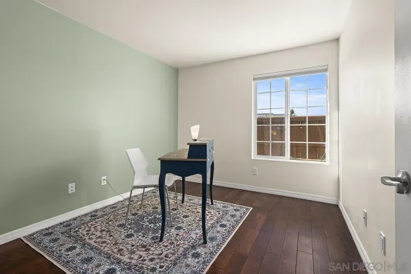 a view of a workspace with furniture