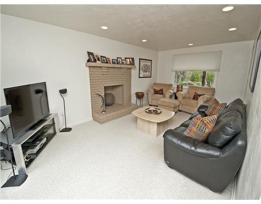 2105 Ramsey Road Monroeville, PA 15146 - Photo 6 of 18 Family Room. RELAX IN THE FAMILY ROOM WHICH BOASTS ANOTHER PICTURE WINDOW, DECORATIVE FIREPLACE & RECESSED LIGHTING.