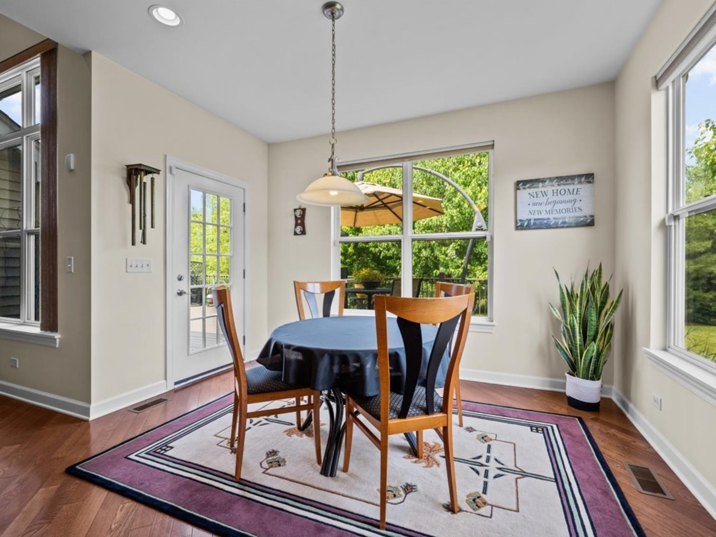 1090 Deerpath Road Aurora, IL 60506 - Photo 11 of 28 a dining room with furniture window wooden floor