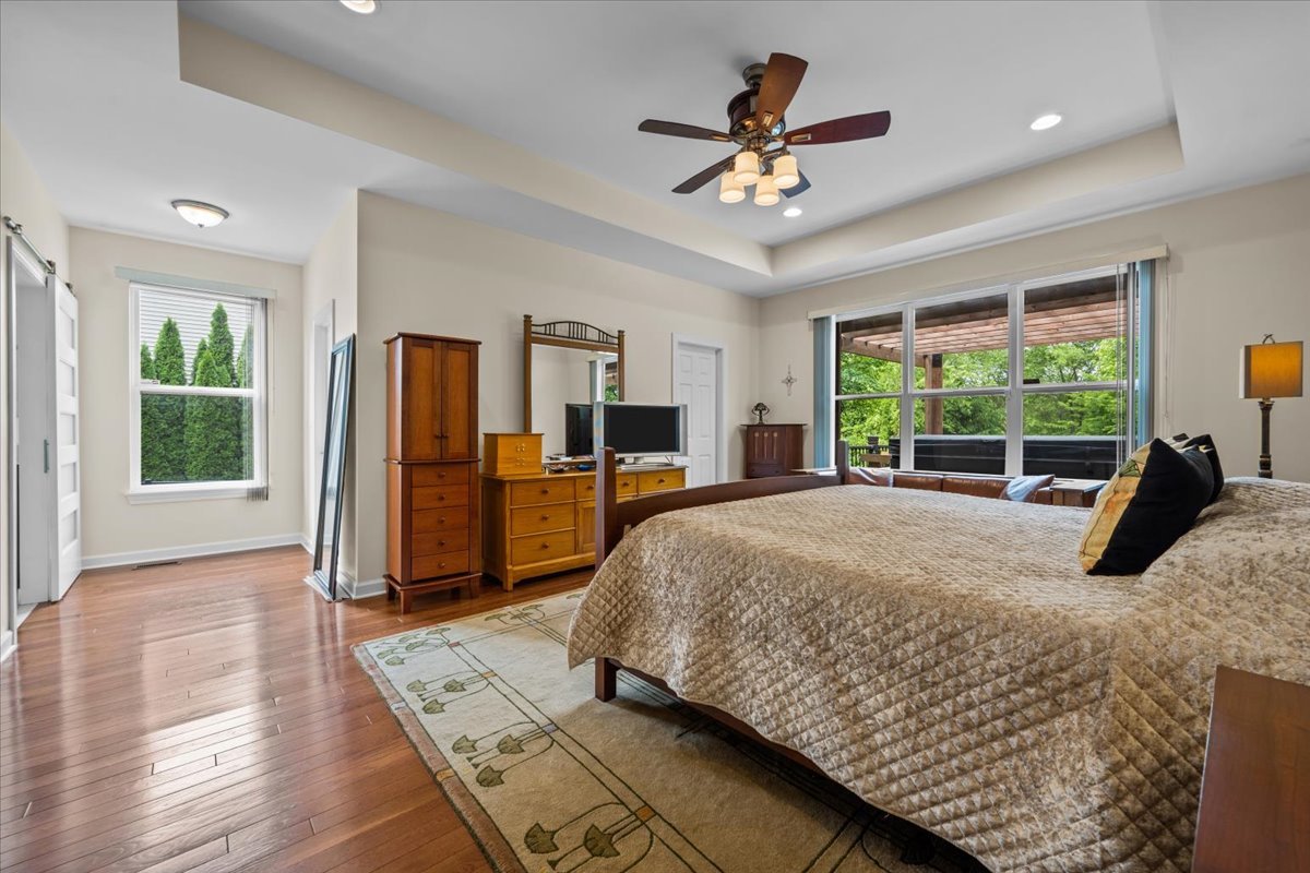 1090 Deerpath Road Aurora, IL 60506 - Photo 14 of 28 a bed sitting in a room next to a window