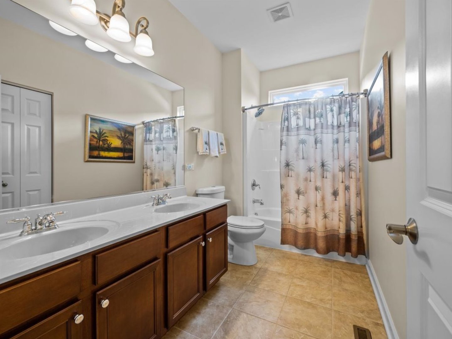1090 Deerpath Road Aurora, IL 60506 - Photo 19 of 28 a bathroom with double vanity sink a large mirror a shower and vanity