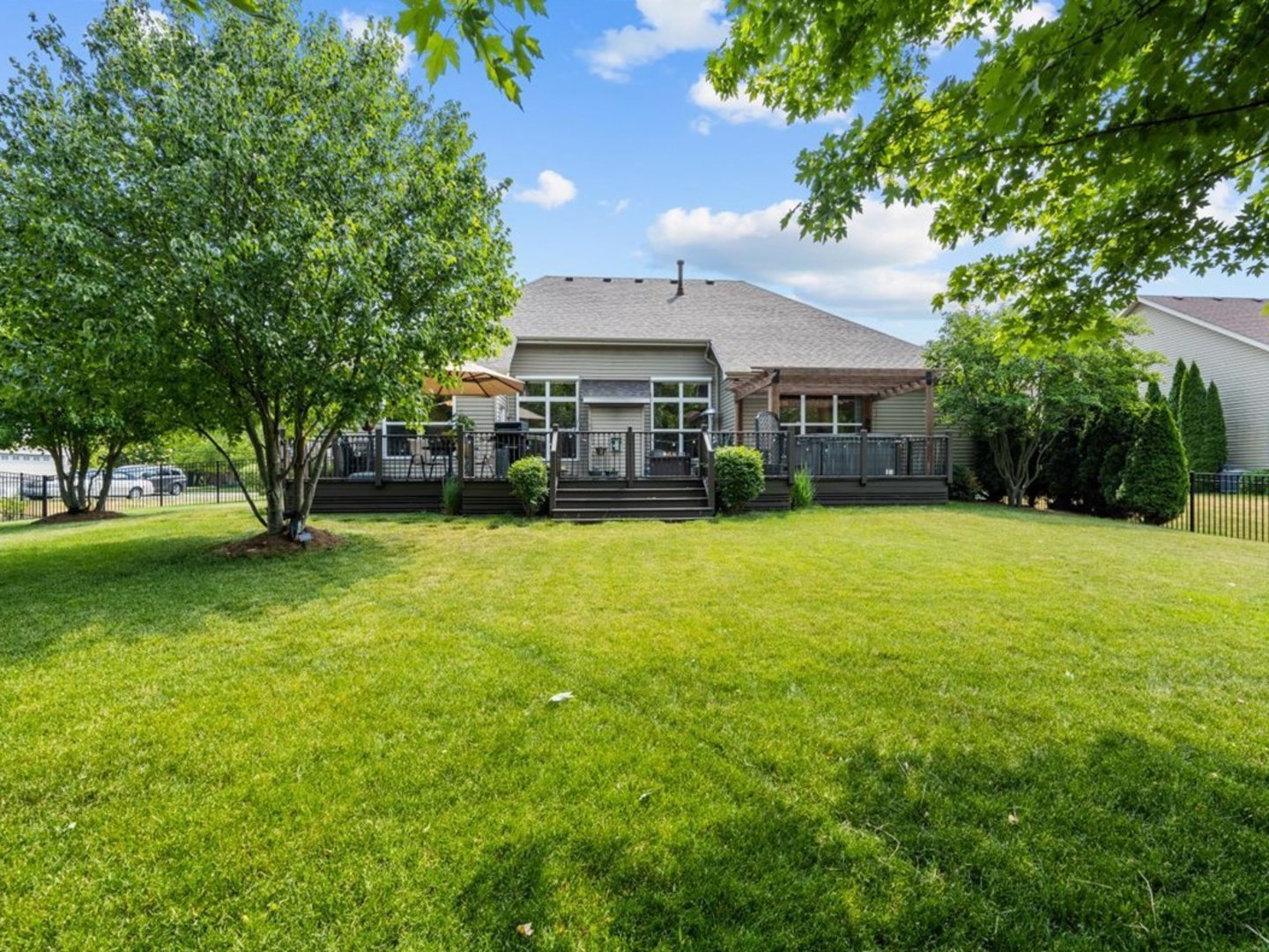 1090 Deerpath Road Aurora, IL 60506 - Photo 22 of 28 a view of a house with a big yard and large trees