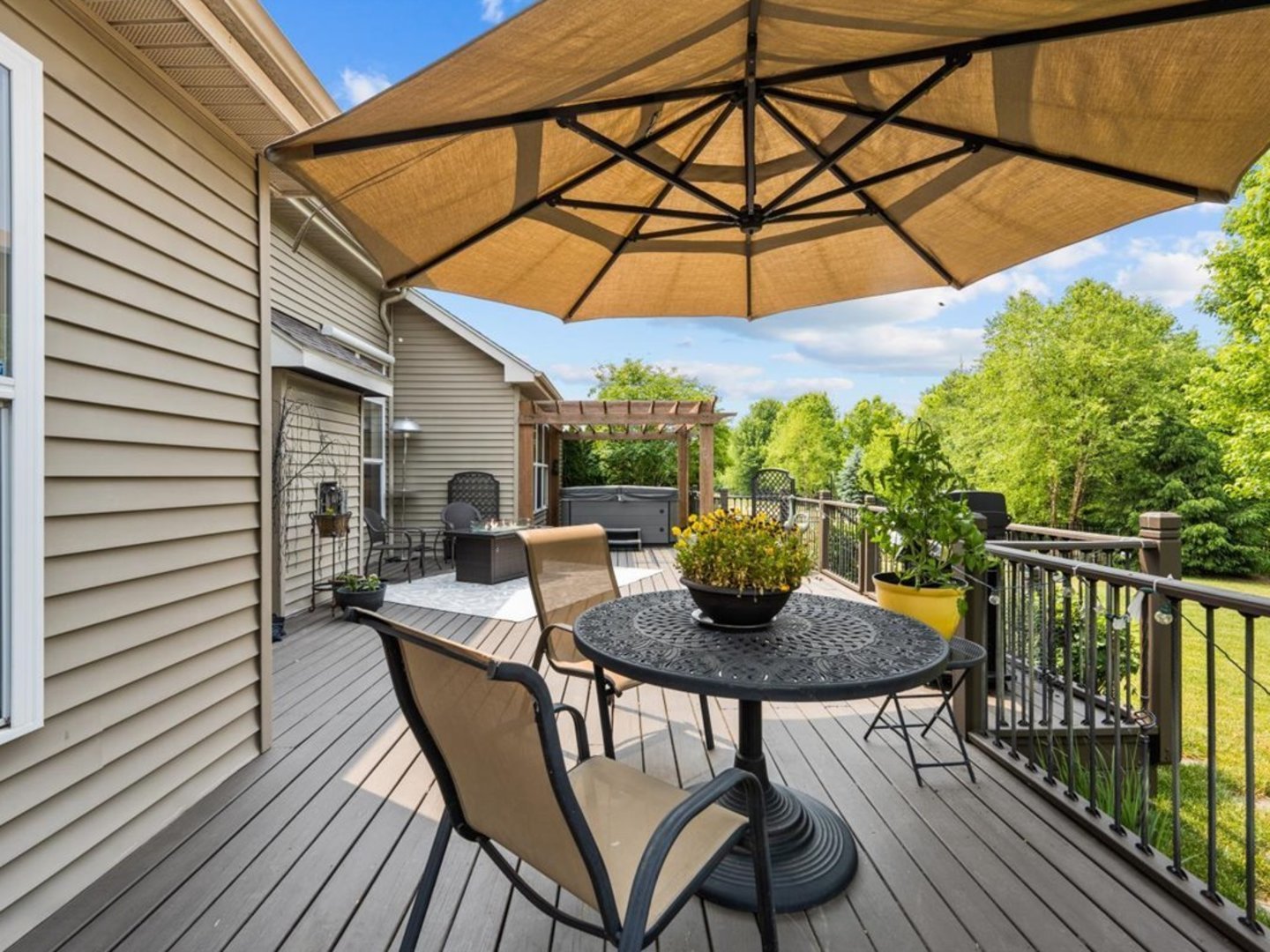 1090 Deerpath Road Aurora, IL 60506 - Photo 24 of 28 a view of balcony with furniture and umbrella