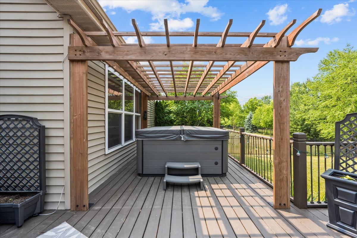 1090 Deerpath Road Aurora, IL 60506 - Photo 25 of 28 a view of balcony with deck and outdoor seating