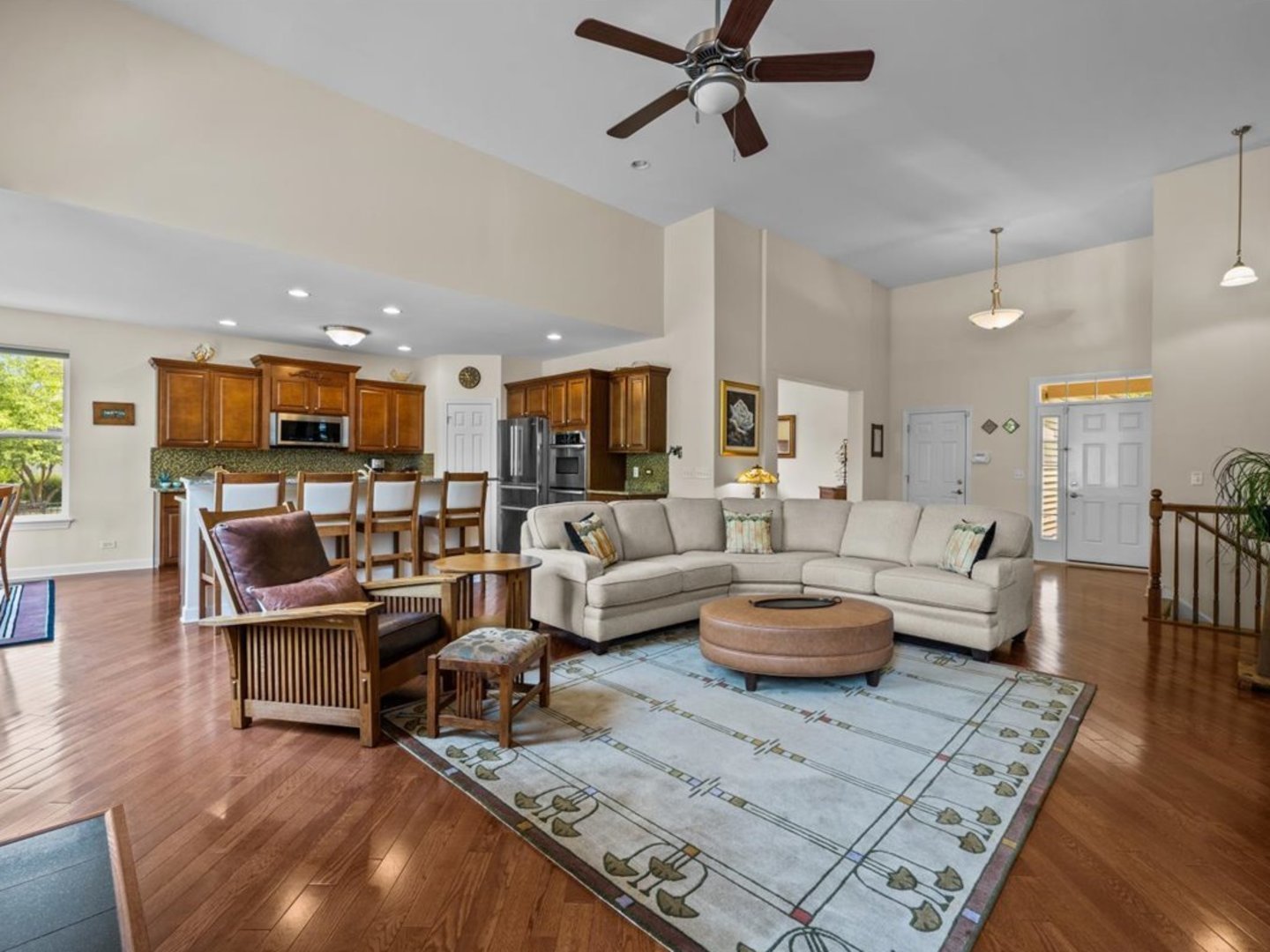 1090 Deerpath Road Aurora, IL 60506 - Photo 6 of 28 a living room with furniture and a view of kitchen