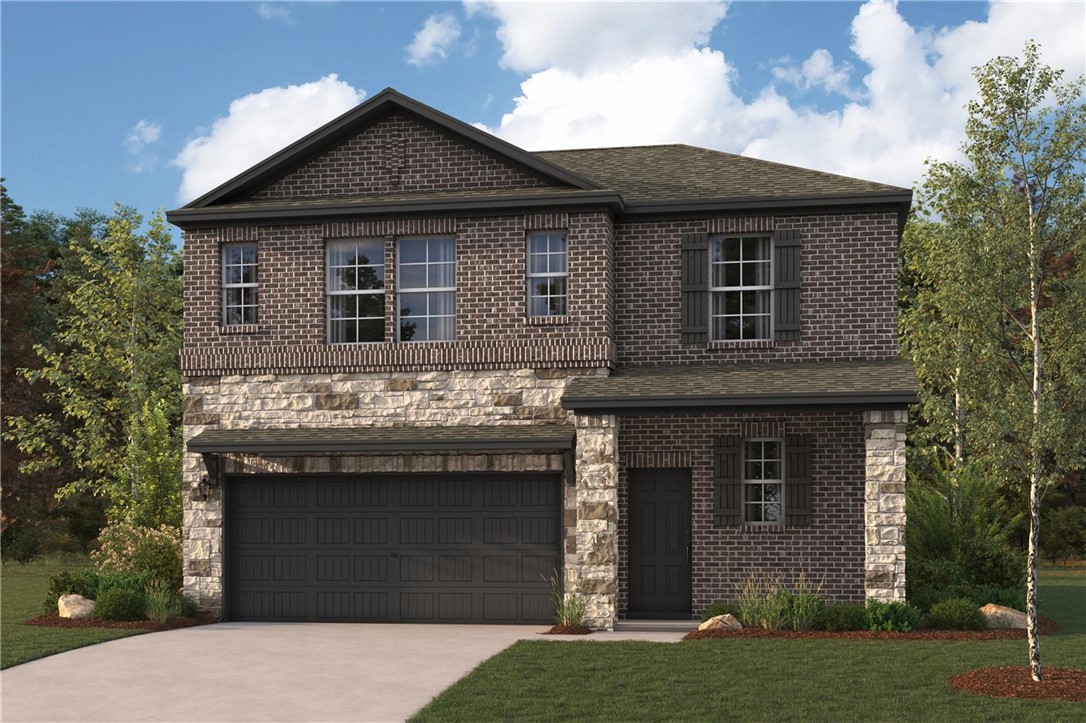 10715 Blocker Court Bryan, TX 77845 - Photo 1 of 7 a front view of a house with a garden