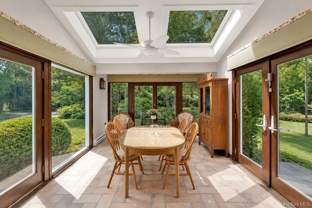 7 Tuthill Lane Remsenburg, NY 11960 - Photo 23 of 43 Sunroom overlooking the gardens