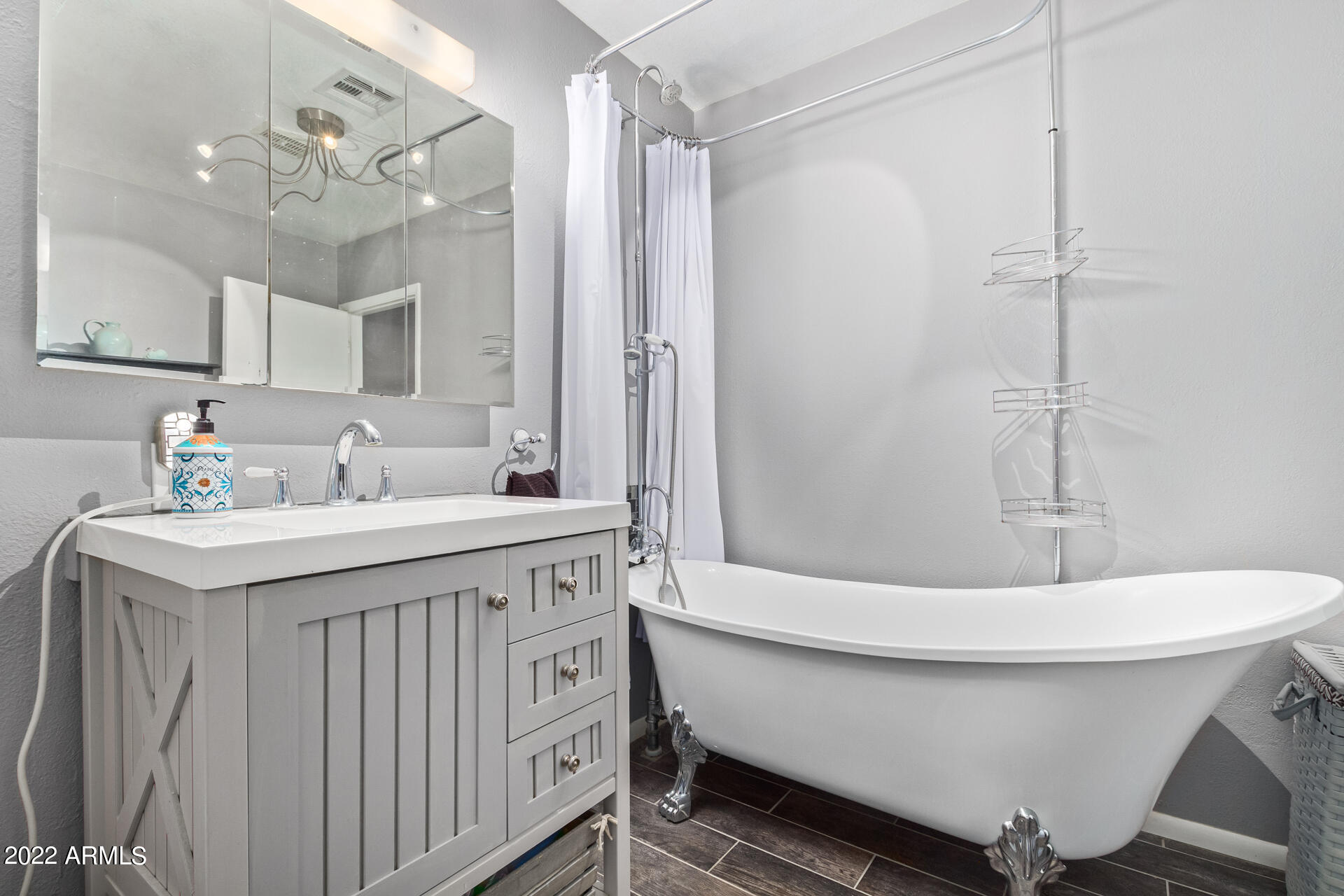 7201 North 16th Drive Phoenix, AZ 85021 - Photo 15 of 29 a bathroom with a sink a toilet and shower