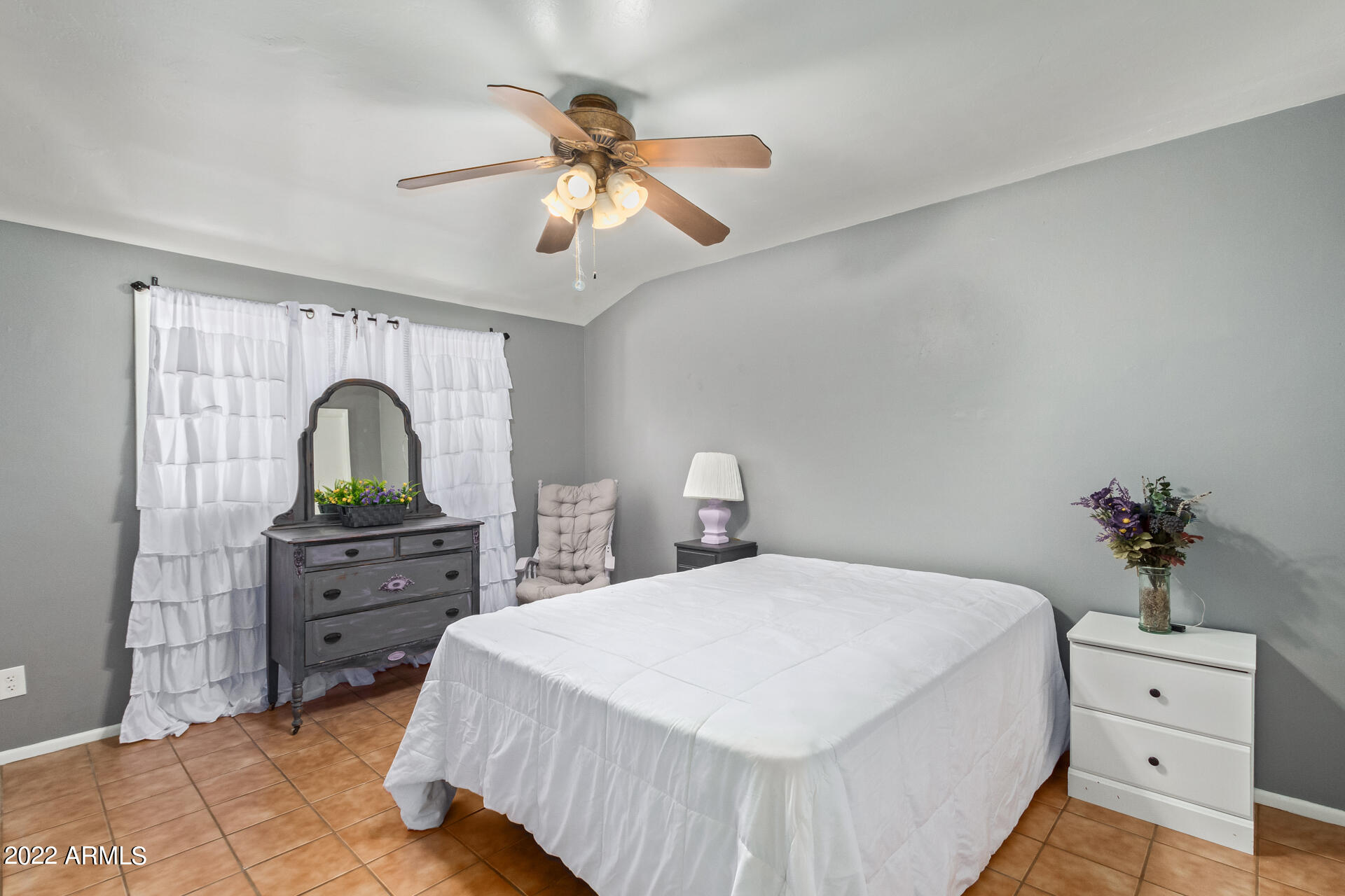 7201 North 16th Drive Phoenix, AZ 85021 - Photo 16 of 29 a bedroom with a bed and a dresser