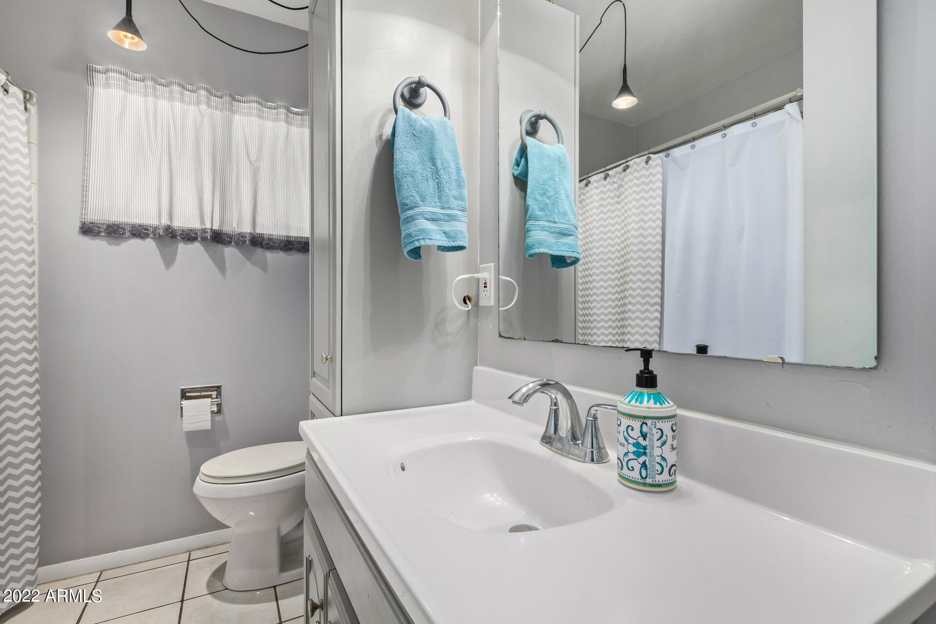 7201 North 16th Drive Phoenix, AZ 85021 - Photo 22 of 29 a bathroom with a sink and a toilet