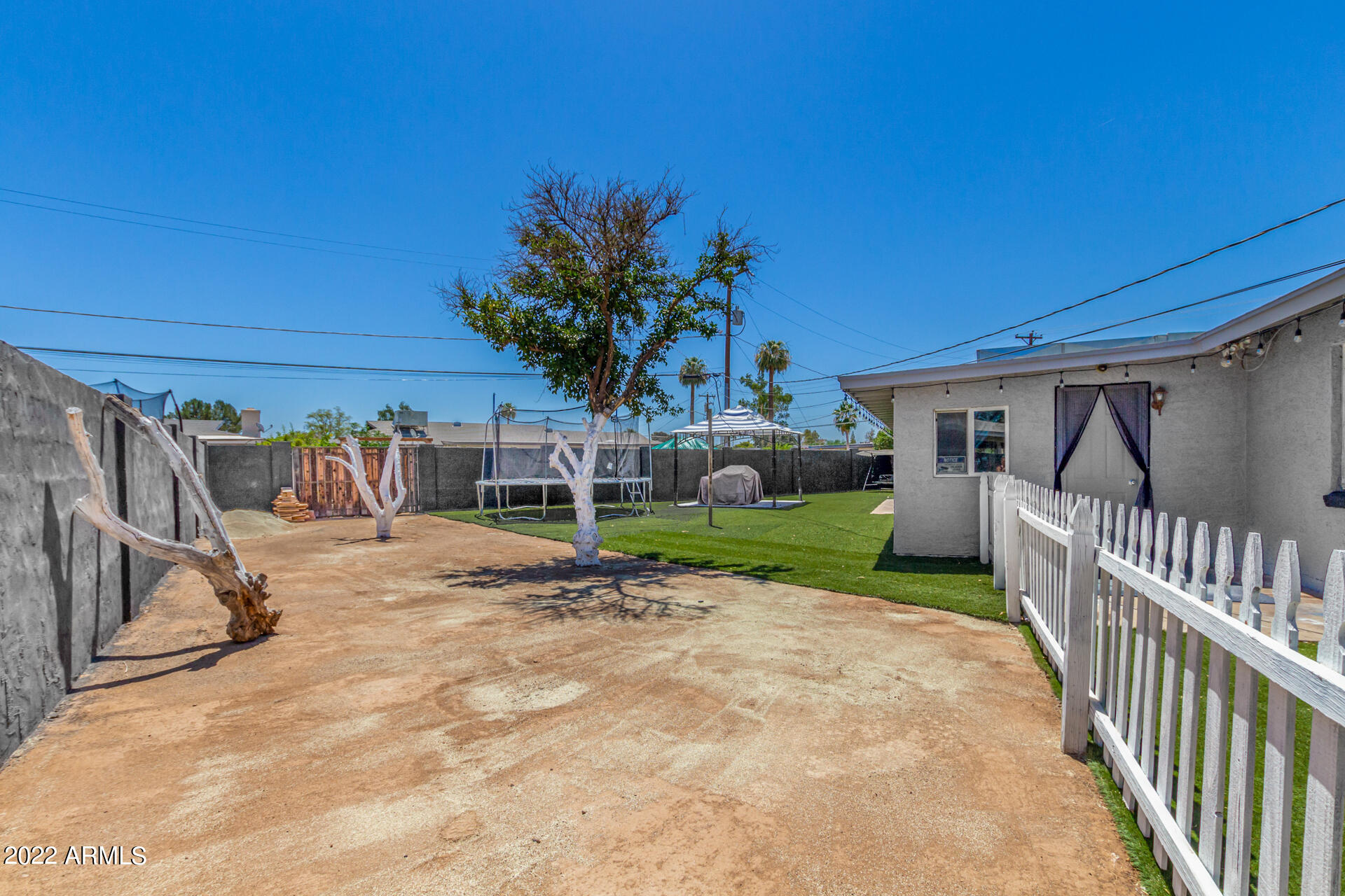 7201 North 16th Drive Phoenix, AZ 85021 - Photo 25 of 29 a view of a house with backyard and porch