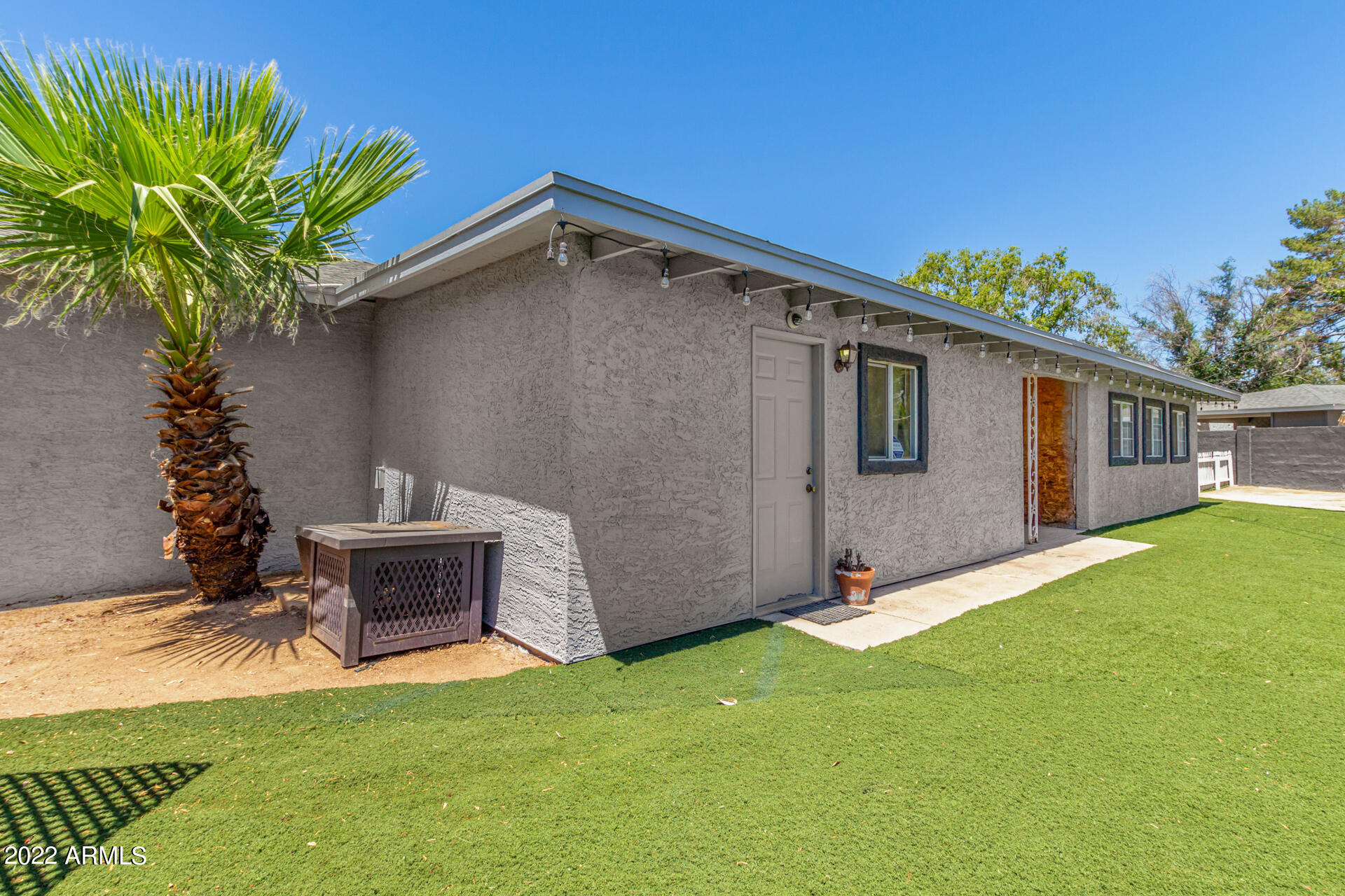 7201 North 16th Drive Phoenix, AZ 85021 - Photo 28 of 29 a view of an house with backyard space and a tree