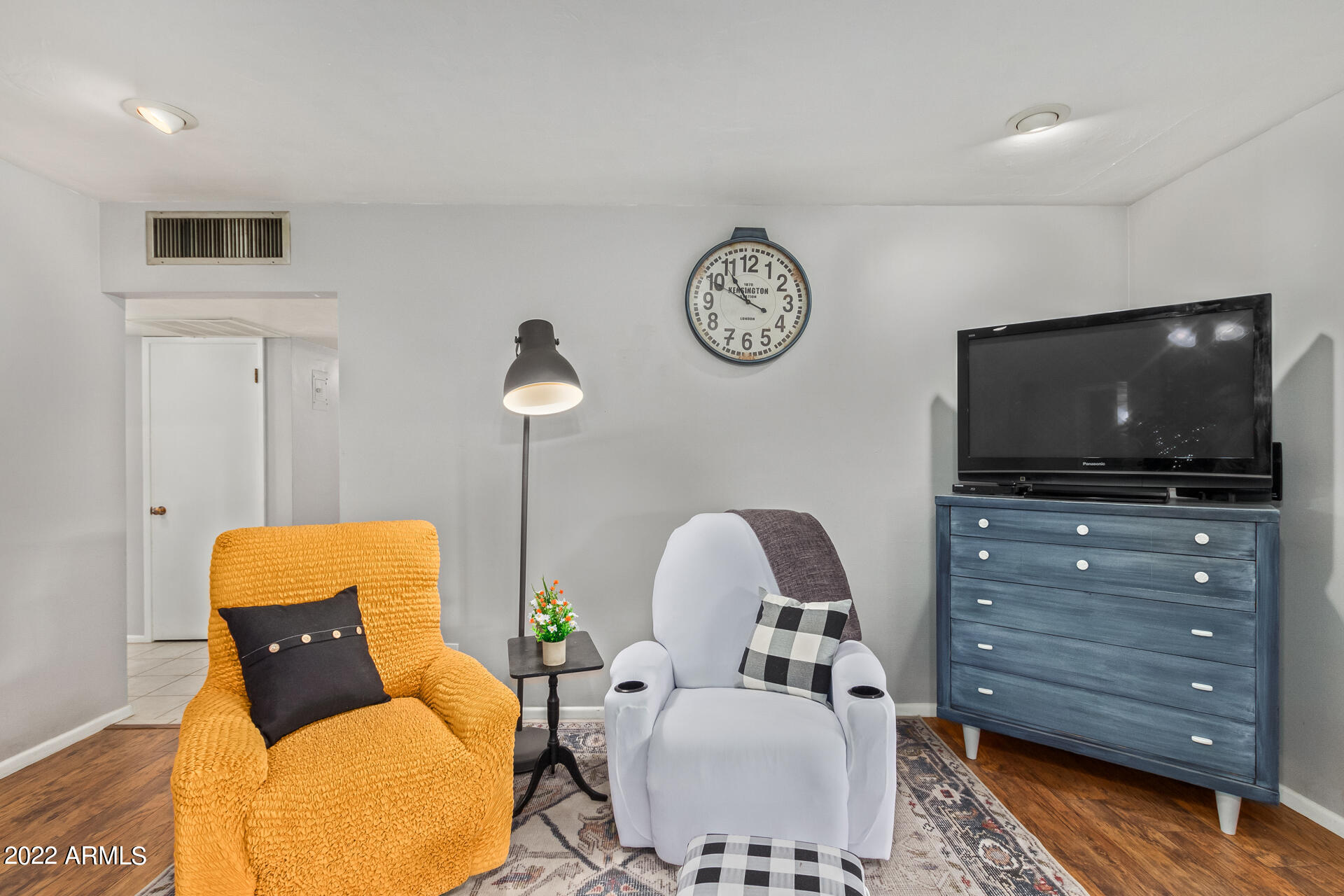 7201 North 16th Drive Phoenix, AZ 85021 - Photo 5 of 29 a living room with furniture and a flat screen tv